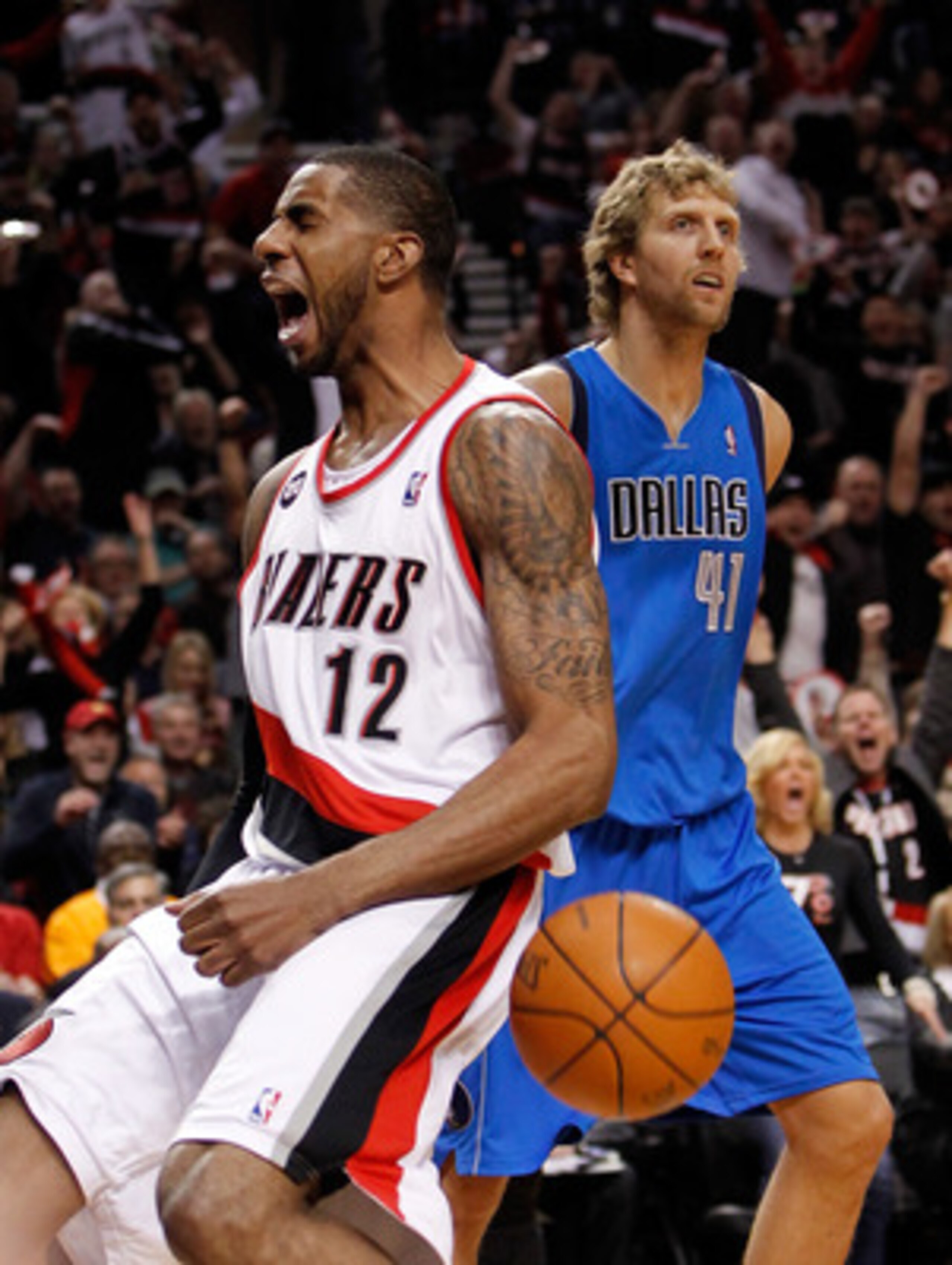 PORTLAND, OR - APRIL 21:  LaMarcus Aldridge #12 of the Portland Trail Blazers celebrates a dunk against the Dallas Mavericks in Game Three of the Western Conference Quarterfinals in the 2011 NBA Playoffs on April 21, 2011 at the Rose Garden in Portland, O