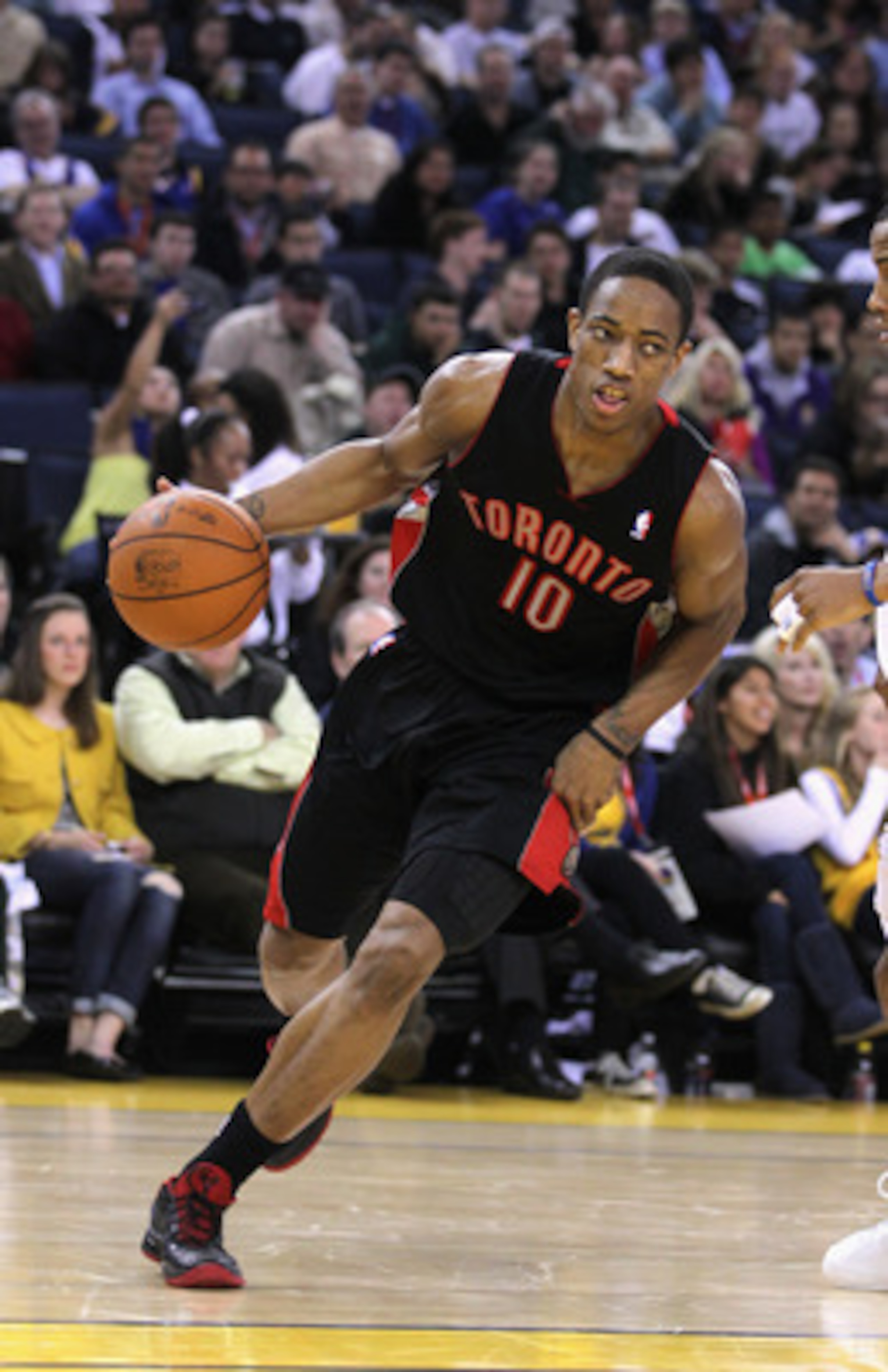OAKLAND, CA - MARCH 25: DeMar DeRozan #10 of the Toronto Raptors in action against the Golden State Warriors at Oracle Arena on March 25, 2011 in Oakland, California. NOTE TO USER: User expressly acknowledges and agrees that, by downloading and or using t