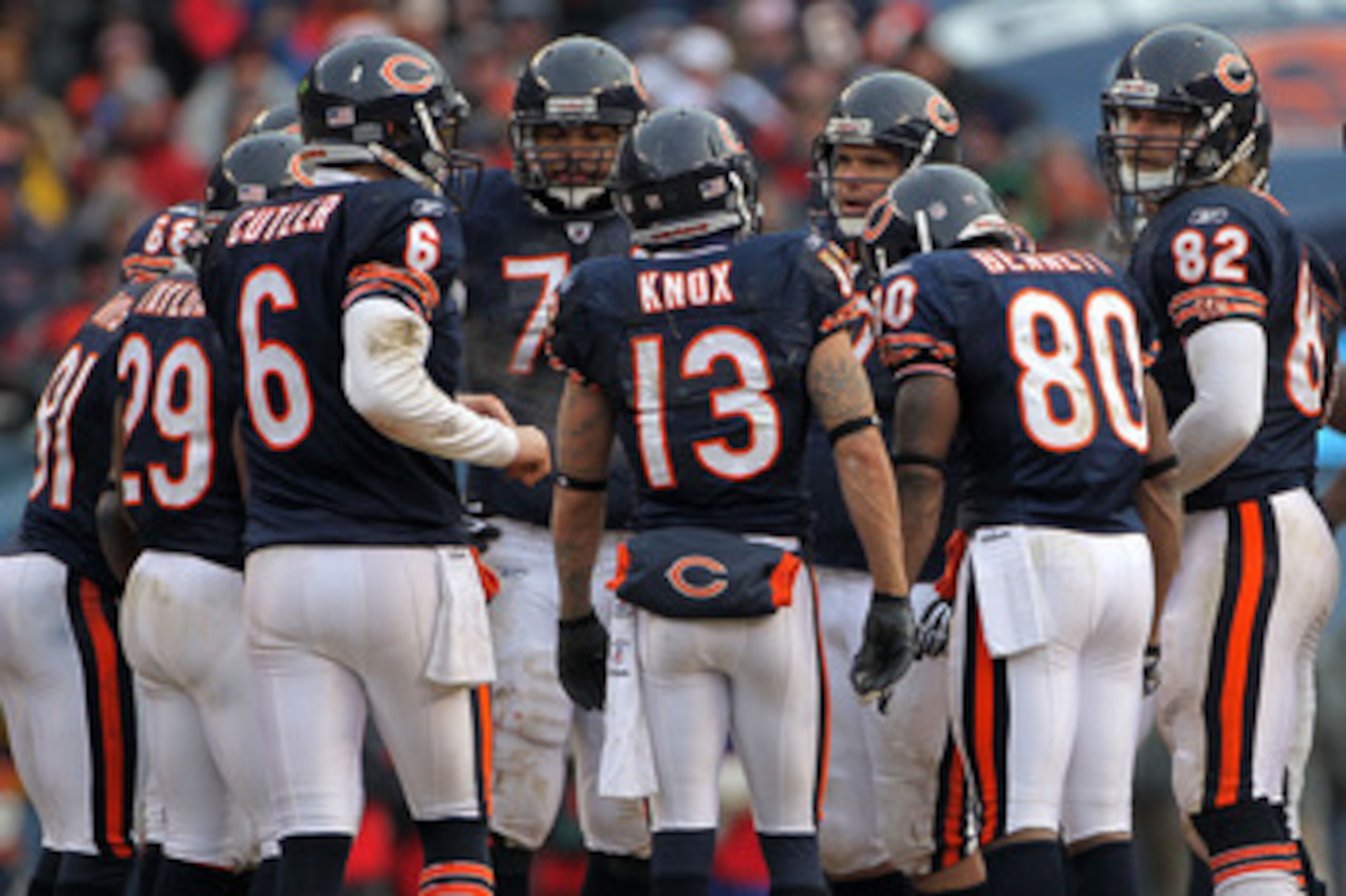 CHICAGO, IL - JANUARY 16:  Jay Cutler #6 of the Chicago Bears huddles with his team against the Seattle Seahawks in the 2011 NFC divisional playoff game at Soldier Field on January 16, 2011 in Chicago, Illinois.  (Photo by Doug Pensinger/Getty Images)