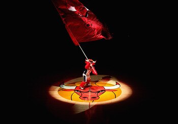 CHICAGO, IL - APRIL 13: Benny, the mascot of the Chicago Bulls, waves a flag before a game between the Bulls and the New Jersey Nets at the United Center on April 13, 2011 in Chicago, Illinois. The Bulls defeated the Nets 97-92. NOTE TO USER: User express
