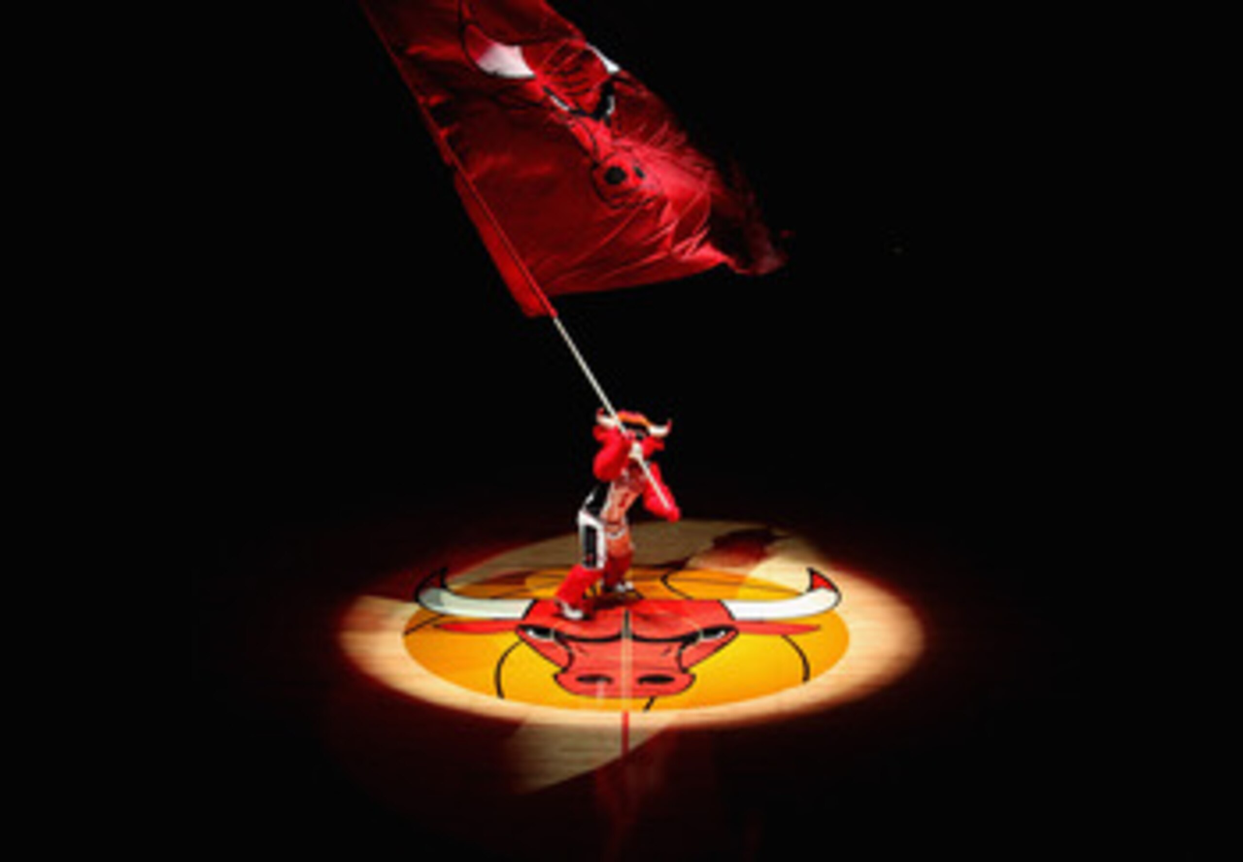 CHICAGO, IL - APRIL 13: Benny, the mascot of the Chicago Bulls, waves a flag before a game between the Bulls and the New Jersey Nets at the United Center on April 13, 2011 in Chicago, Illinois. The Bulls defeated the Nets 97-92. NOTE TO USER: User express