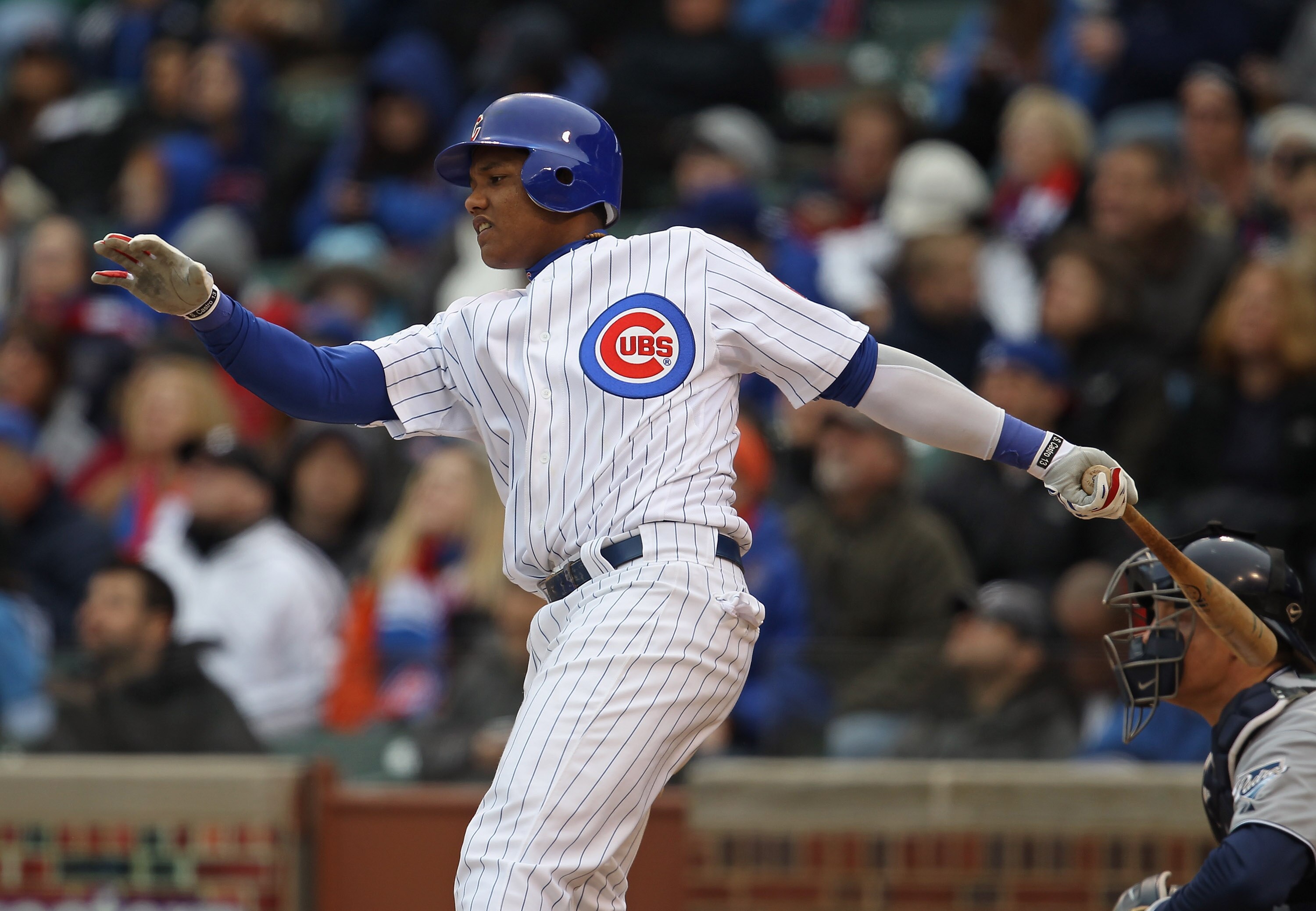 CHICAGO, IL - APRIL 20: Starlin Castro #13 of the Chicago Cubs takes a swing against the San Diego Padres at Wrigley Field on April 20, 2011 in Chicago, Illinois. The Cubs defeated the Padres 2-1 in 11 innings. (Photo by Jonathan Daniel/Getty Images)