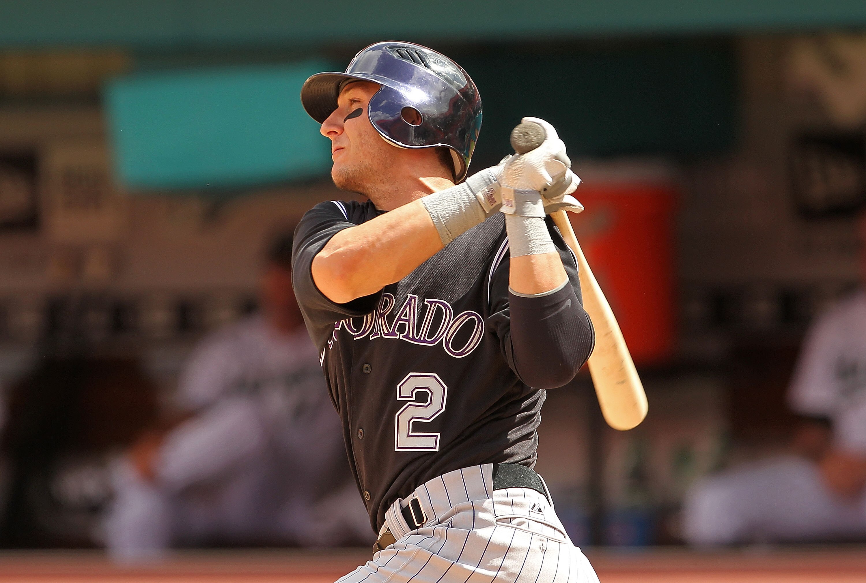 MIAMI GARDENS, FL - APRIL 24:  Troy Tulowitzki #2 of the Colorado Rockies hits a 2 RBI double during a game against the Florida Marlins  at Sun Life Stadium on April 24, 2011 in Miami Gardens, Florida.  (Photo by Mike Ehrmann/Getty Images)