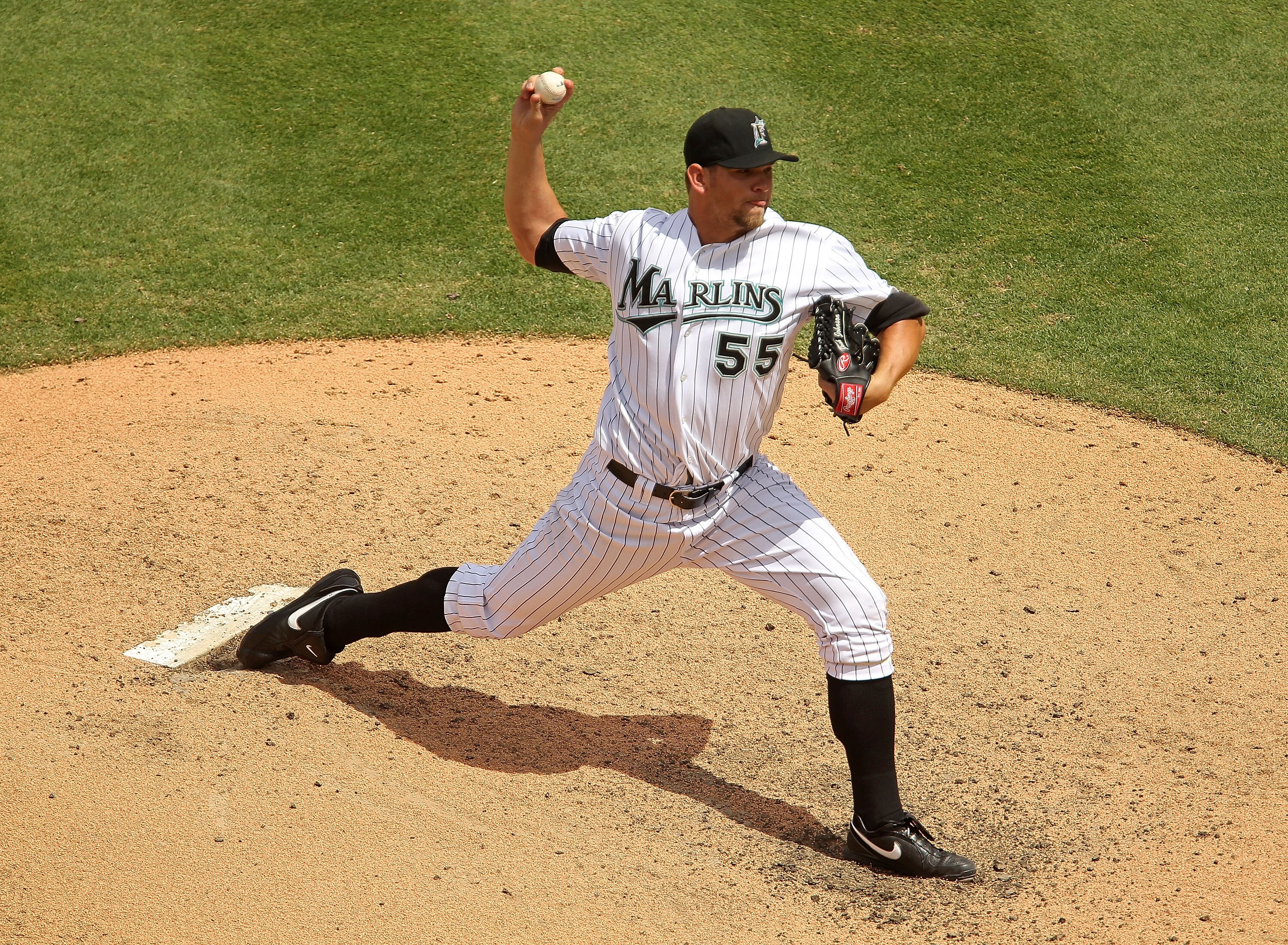 MIAMI GARDENS, FL - APRIL 24:  Josh Johnson #55 of the Florida Marlins pitches during a game against the Colorado Rockies at Sun Life Stadium on April 24, 2011 in Miami Gardens, Florida.  (Photo by Mike Ehrmann/Getty Images)
