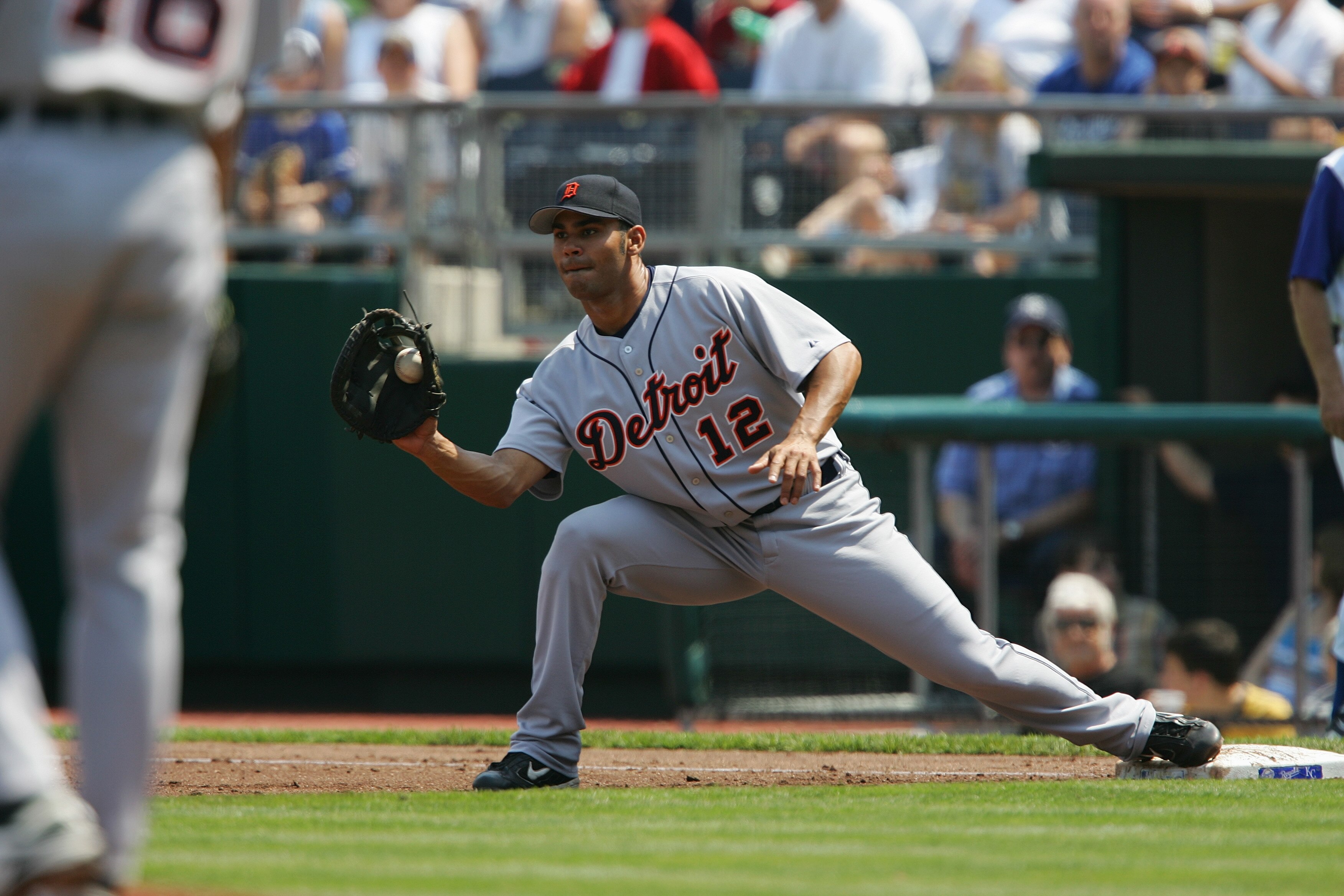 KANSAS CITY, MO - APRIL 17:  Carlos Pena #12 of the Detroit Tigers makes a catch at first base during the game with the Kansas City Royals on April 17,2005 at Kauffman Stadium in Kansas City, Missouri. The Tigers won 6-1. (Photo by Elsa/Getty Images)