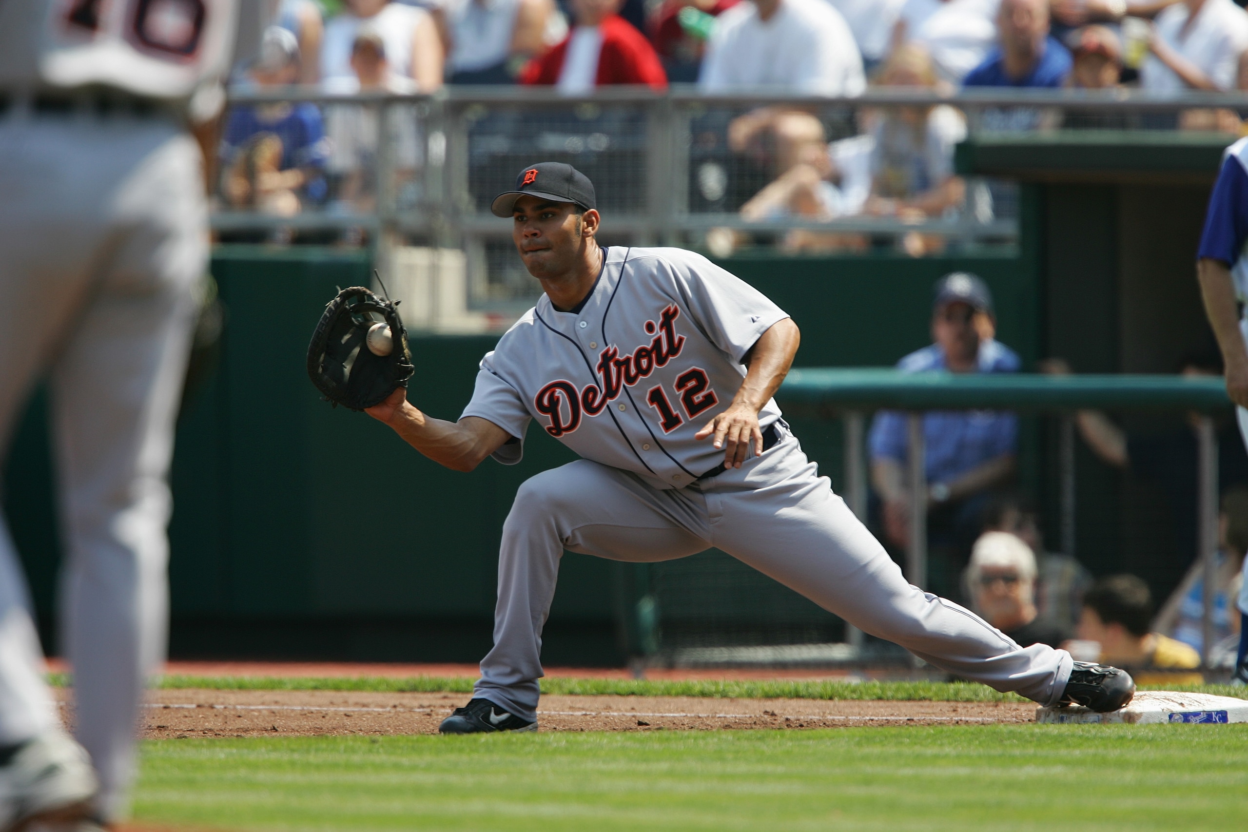 KANSAS CITY, MO - APRIL 17:  Carlos Pena #12 of the Detroit Tigers makes a catch at first base during the game with the Kansas City Royals on April 17,2005 at Kauffman Stadium in Kansas City, Missouri. The Tigers won 6-1. (Photo by Elsa/Getty Images)