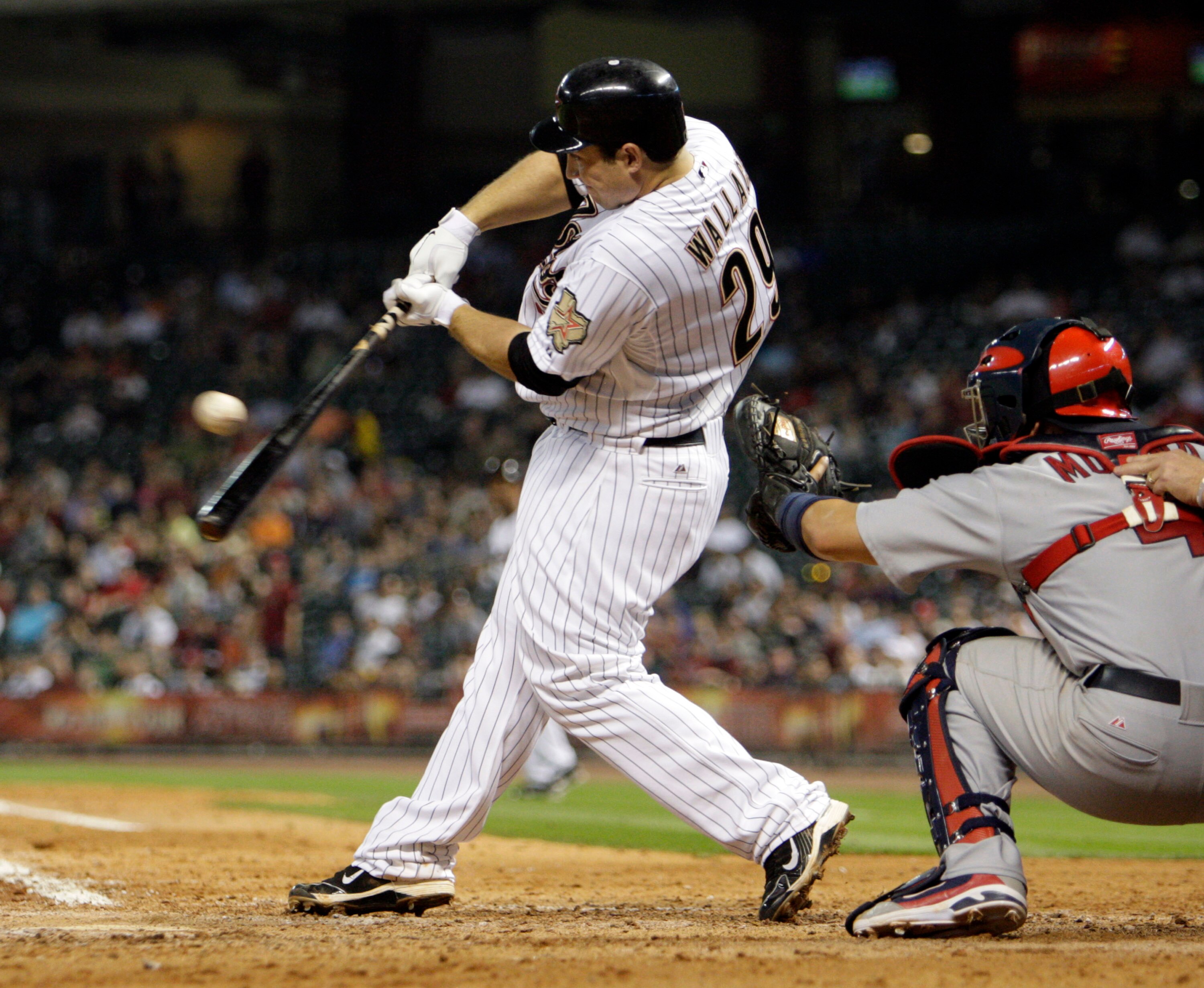 HOUSTON - APRIL 26:  Brett Wallace #29 of the Houston Astros singles to left field in the sixth inning against the St. Louis Cardinals at Minute Maid Park on April 26, 2011 in Houston, Texas.  (Photo by Bob Levey/Getty Images)