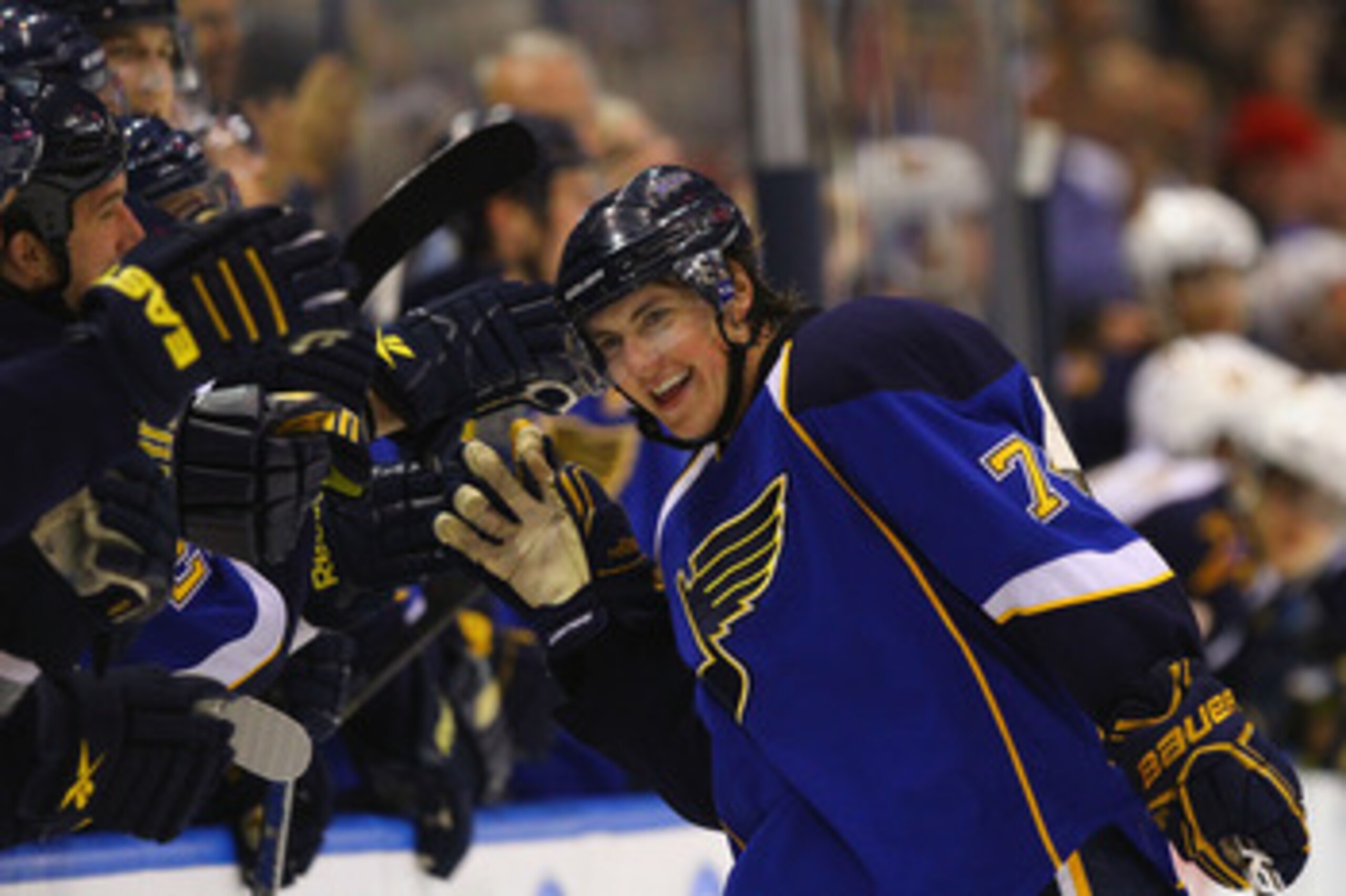 ST. LOUIS - OCTOBER 30: T.J. Oshie #74 of the St. Louis Blues is congratulated by his teammates after scoring a goal during the overtime shootout against the Atlanta Thrashers at the Scottrade Center on October 30, 2010 in St. Louis, Missouri.  The Blues