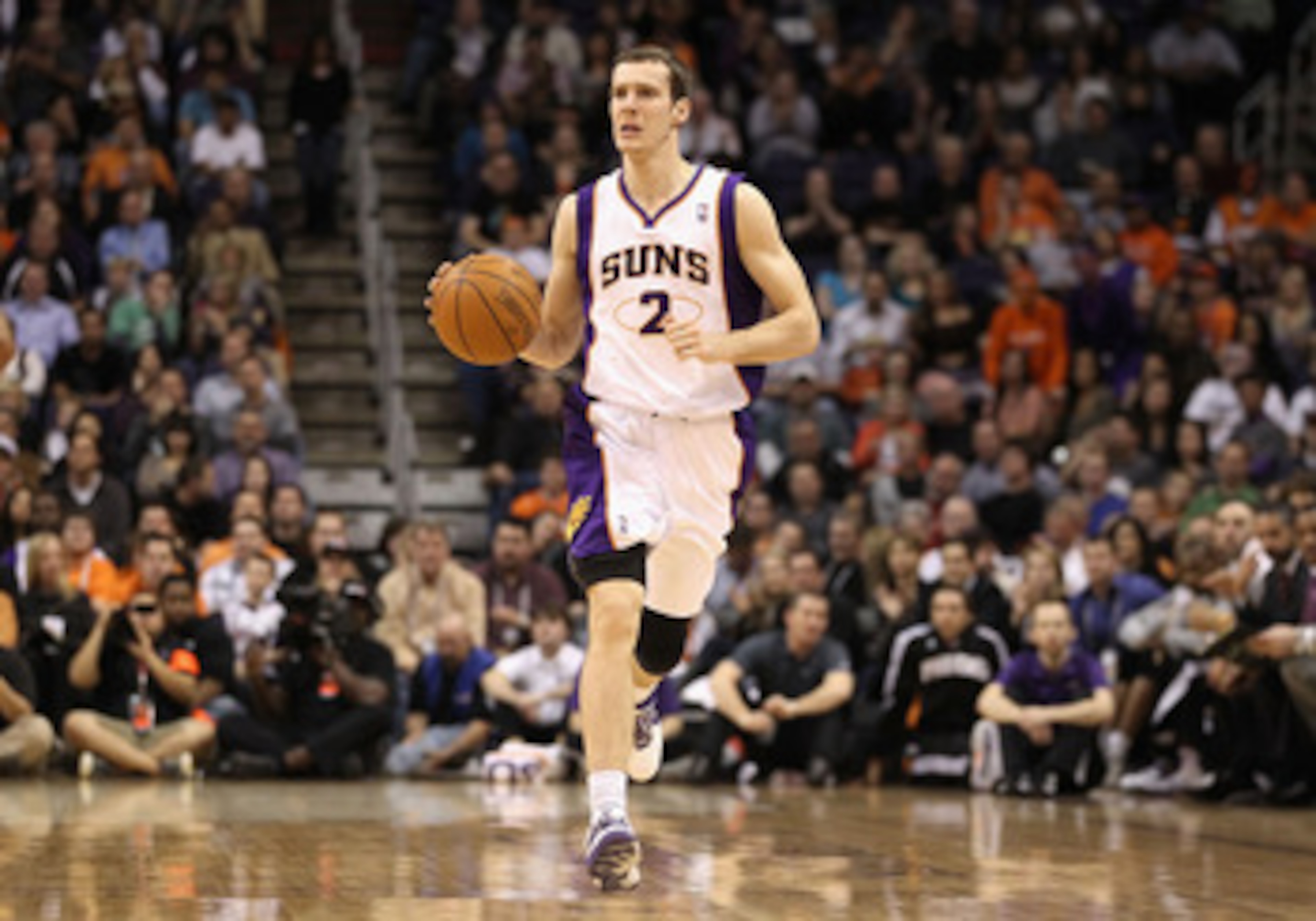 PHOENIX, AZ - JANUARY 14: Goran Dragic #2 of the Phoenix Suns hanldes the ball during the NBA game against the Portland Trail Blazers at US Airways Center on January 14, 2011 in Phoenix, Arizona. The Suns defeated the Trail Blazers 115-111. NOTE TO USER: PHOENIX, AZ - JANUARY 14: Goran Dragic #2 of the Phoenix Suns hanldes the ball during the NBA game against the Portland Trail Blazers at US Airways Center on January 14, 2011 in Phoenix, Arizona. The Suns defeated the Trail Blazers 115-111. NOTE TO USER: