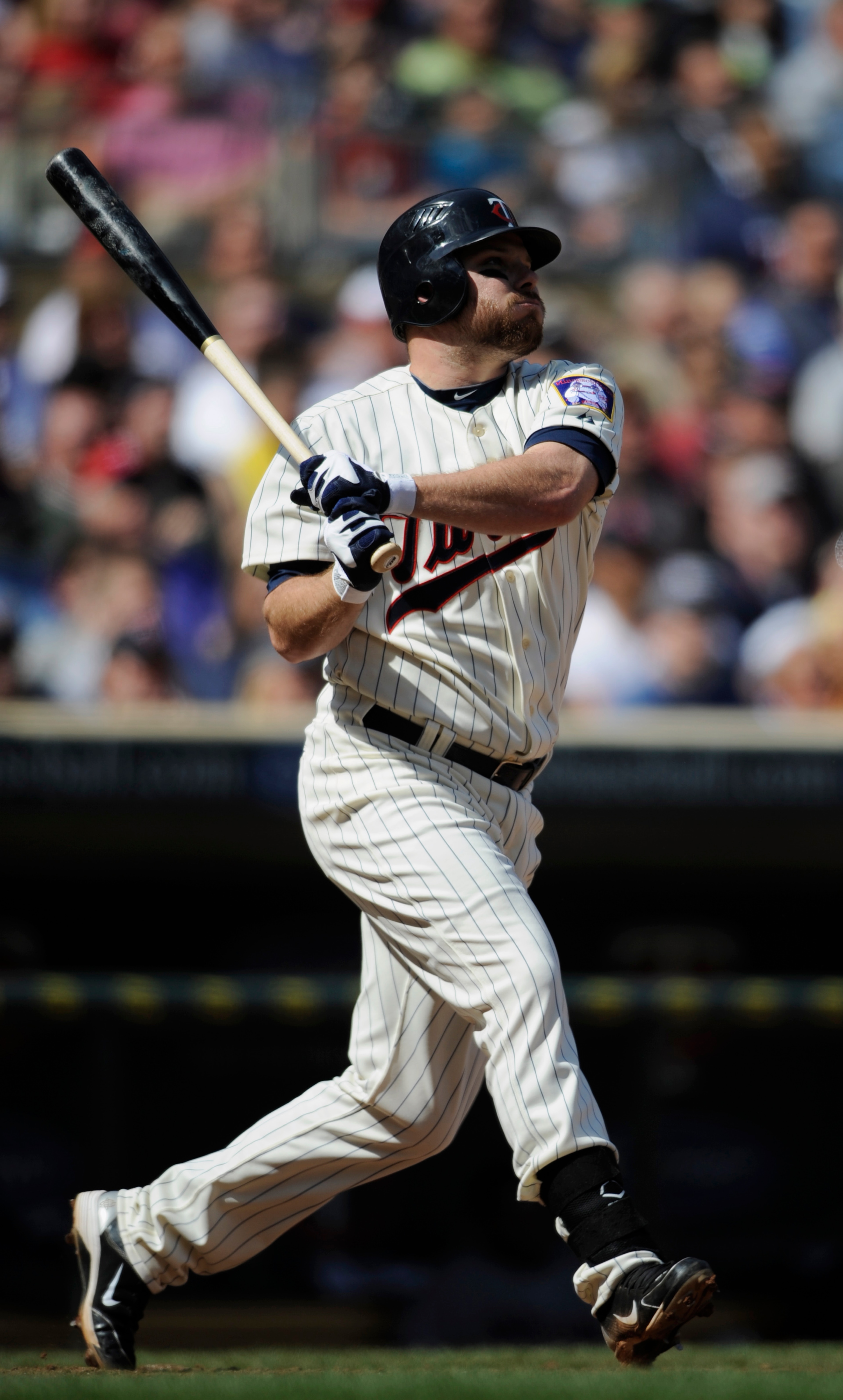 MINNEAPOLIS, MN - APRIL 24: Jason Kubel #16 of the Minnesota Twins hits a two-run double against the Cleveland Indians during the seventh inning of their game on April 24, 2011 at Target Field in Minneapolis, Minnesota. Twins defeated the Indians 4-3. (Ph MINNEAPOLIS, MN - APRIL 24: Jason Kubel #16 of the Minnesota Twins hits a two-run double against the Cleveland Indians during the seventh inning of their game on April 24, 2011 at Target Field in Minneapolis, Minnesota. Twins defeated the Indians 4-3. (Ph