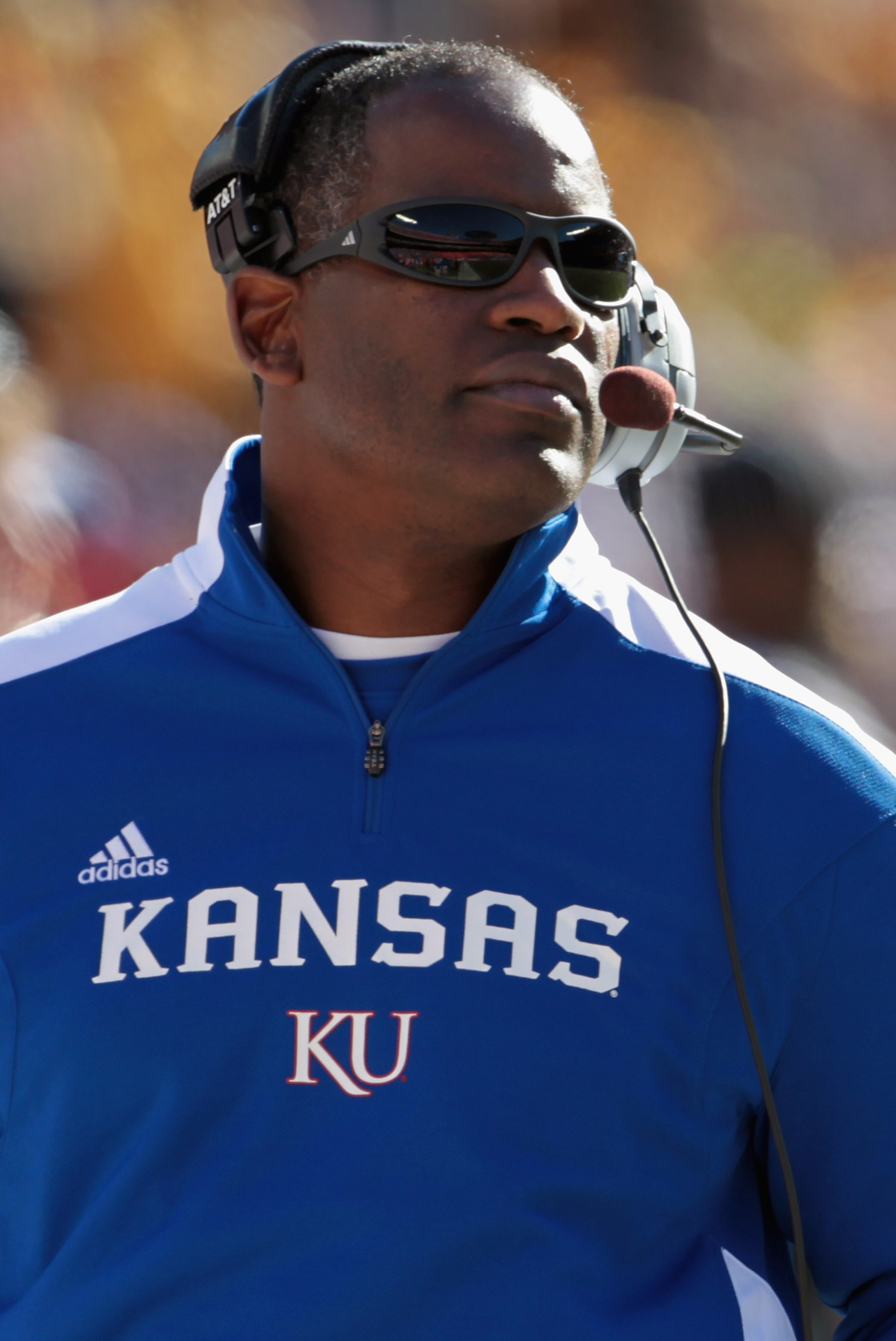 KANSAS CITY, MO - NOVEMBER 27: Head coach Turner Gill of the Kansas Jayhawks coaches from the sidelines during the game against the Missouri Tigers on November 27, 2010 at Arrowhead Stadium in Kansas City, Missouri. (Photo by Jamie Squire/Getty Images) KANSAS CITY, MO - NOVEMBER 27: Head coach Turner Gill of the Kansas Jayhawks coaches from the sidelines during the game against the Missouri Tigers on November 27, 2010 at Arrowhead Stadium in Kansas City, Missouri. (Photo by Jamie Squire/Getty Images)