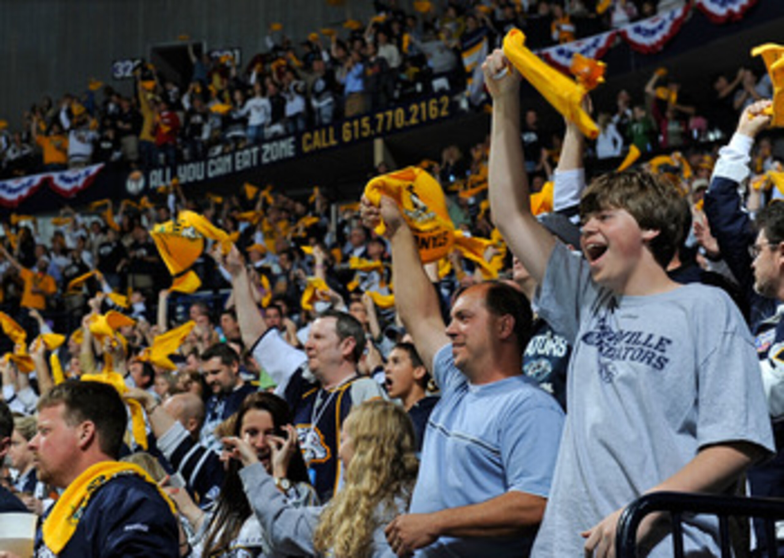 NASHVILLE, TN - APRIL 24:  Fans of the Nashville Predators cheer during a timeout in a game against the Anaheim Ducks in Game Six of the Western Conference Quarterfinals during the 2011 NHL Stanley Cup Playoffs at Bridgestone Arena on April 24, 2011 in Na