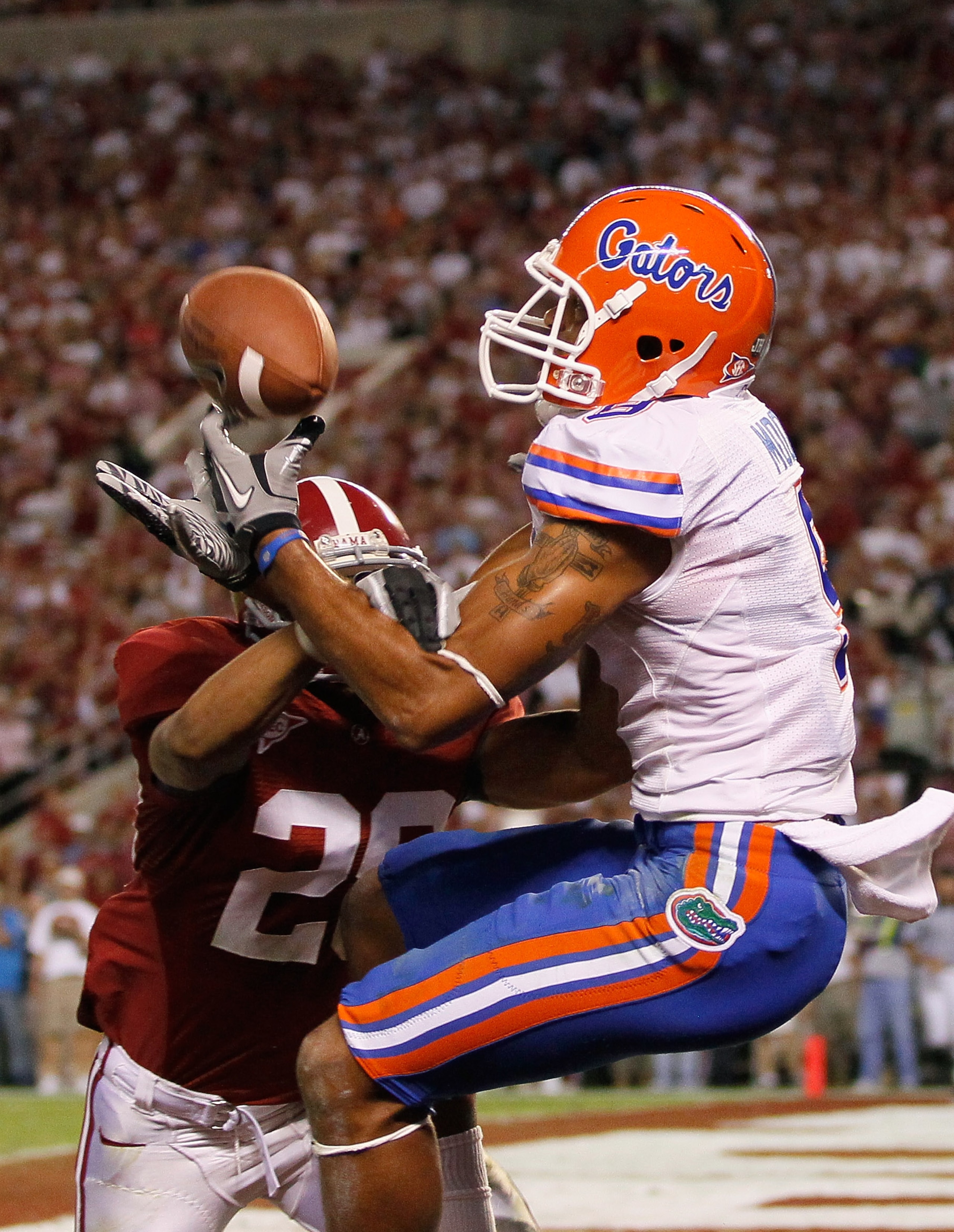 TUSCALOOSA, AL - OCTOBER 02: DeMarcus Milliner #28 of the Alabama Crimson Tide is flagged for pass interference on this missed touchdown reception to Carl Moore #9 of the Florida Gators at Bryant-Denny Stadium on October 2, 2010 in Tuscaloosa, Alabama. TUSCALOOSA, AL - OCTOBER 02: DeMarcus Milliner #28 of the Alabama Crimson Tide is flagged for pass interference on this missed touchdown reception to Carl Moore #9 of the Florida Gators at Bryant-Denny Stadium on October 2, 2010 in Tuscaloosa, Alabama.