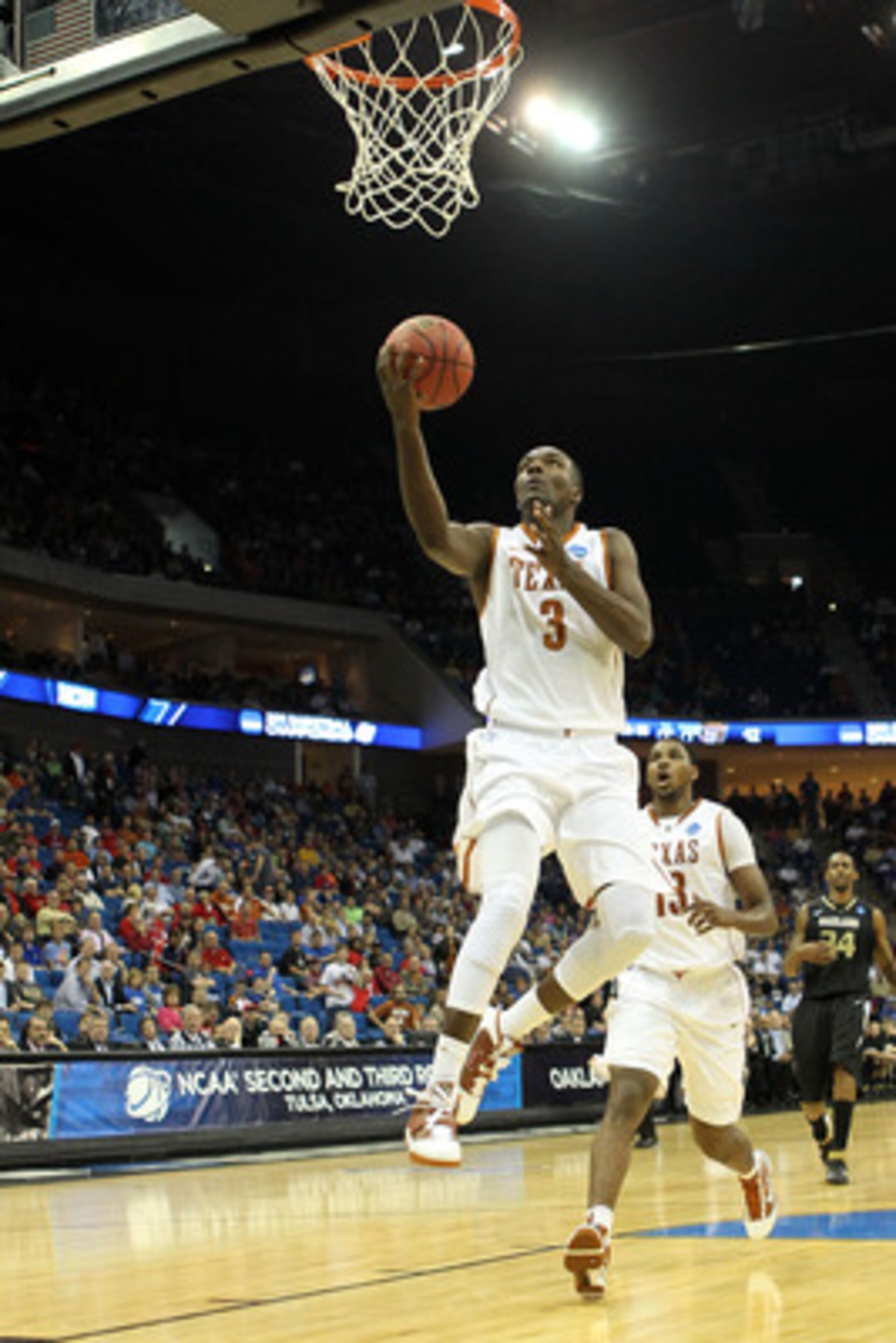 TULSA, OK - MARCH 18:  Jordan Hamilton #3 of the Texas Longhorns goes up for a shot against the Oakland Golden Grizzlies during the second round of the 2011 NCAA men's basketball tournament at BOK Center on March 18, 2011 in Tulsa, Oklahoma.  (Photo by Ro