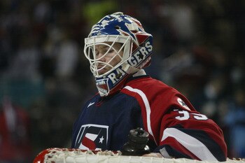 SALT LAKE CITY - FEBRUARY 22:  Goaltender Mike Richter #35 of the USA takes a rest during a break in the game against Russia in the men's ice hockey semifinal during the Salt Lake City Winter Olympic Games at the E Center in Salt Lake City, Utah. USA defe