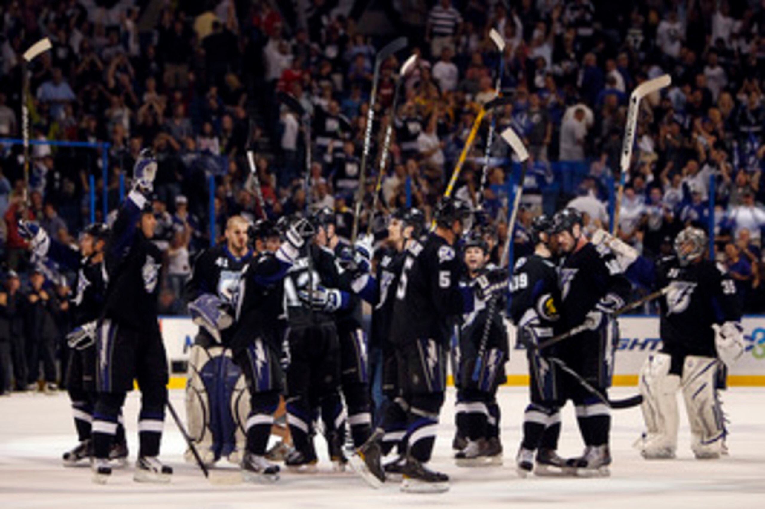 TAMPA, FL - APRIL 25: The Tampa Bay Lightning salute the fans after a 4-2 win over the Pittsburgh Penguins in Game Six of the Eastern Conference Quarterfinals during the 2011 NHL Stanley Cup Playoffs at the St. Pete Times Forum on April 25, 2011 in Tampa,