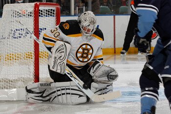 SUNRISE, FL - DECEMBER 27: Goaltender Tim Thomas #30 of the Boston Bruins stops a shot by Michael Santorelli #13 of the Florida Panthers  on December 27, 2010 at the BankAtlantic Center in Sunrise, Florida. The Bruins defeated the Panthers 3-2 in a shoot-