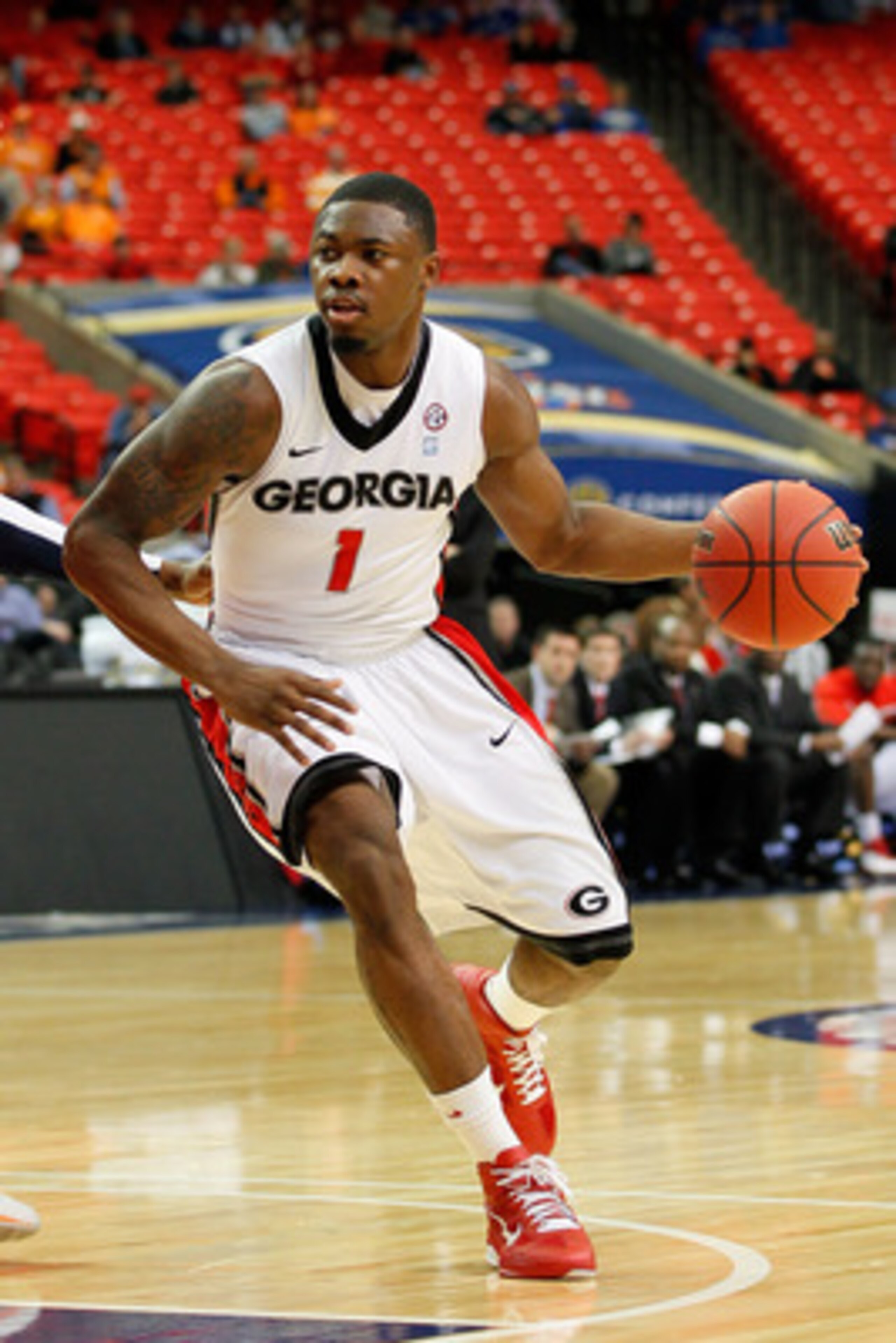 ATLANTA, GA - MARCH 10:  Travis Leslie #1 of the Georgia Bulldogs drives against the Auburn Tigers during the the first round of the SEC Men's Basketball Tournament at the Georgia Dome on March 10, 2011 in Atlanta, Georgia.  (Photo by Kevin C. Cox/Getty I