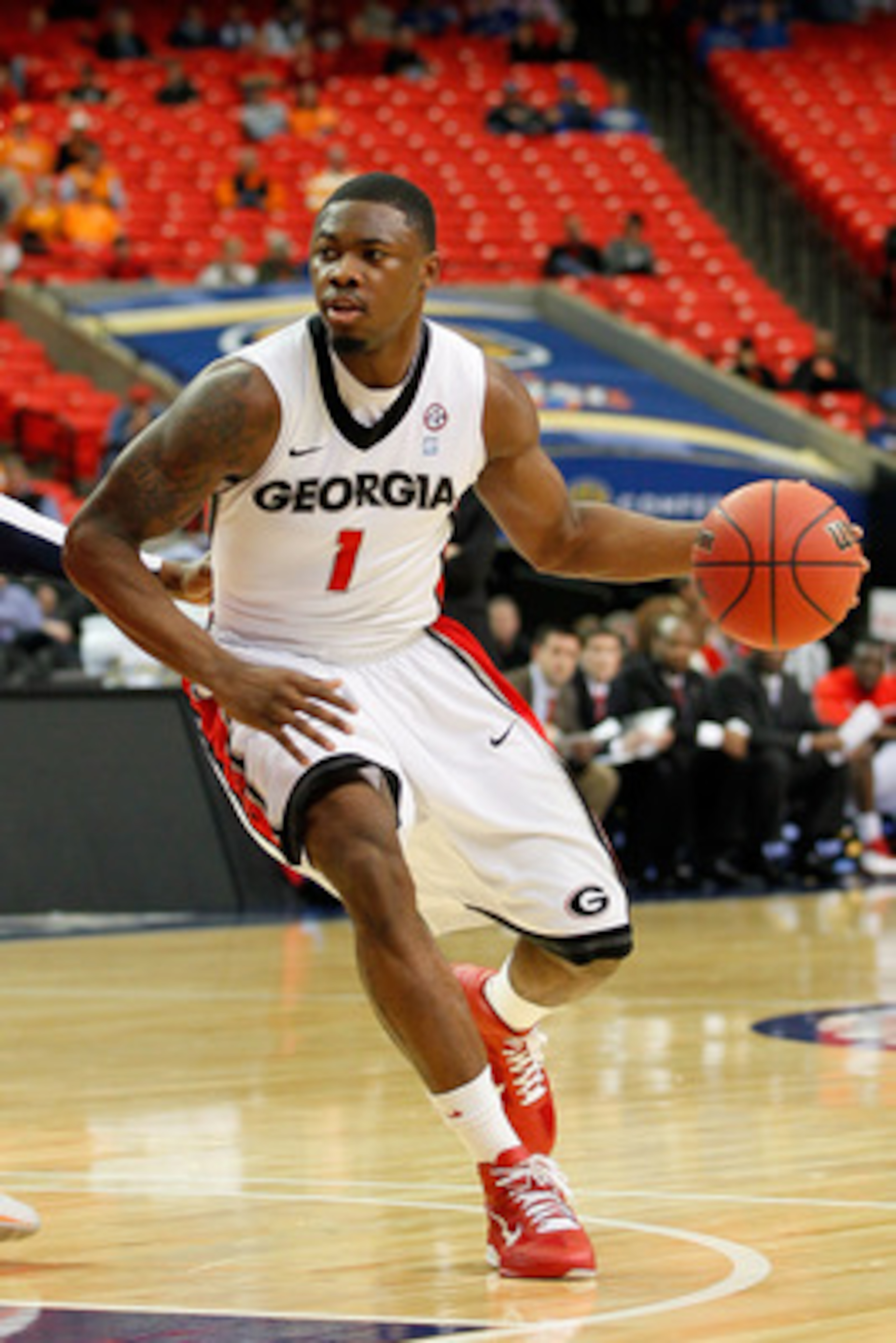 ATLANTA, GA - MARCH 10: Travis Leslie #1 of the Georgia Bulldogs drives against the Auburn Tigers during the the first round of the SEC Men's Basketball Tournament at the Georgia Dome on March 10, 2011 in Atlanta, Georgia. (Photo by Kevin C. Cox/Getty I ATLANTA, GA - MARCH 10: Travis Leslie #1 of the Georgia Bulldogs drives against the Auburn Tigers during the the first round of the SEC Men's Basketball Tournament at the Georgia Dome on March 10, 2011 in Atlanta, Georgia. (Photo by Kevin C. Cox/Getty I