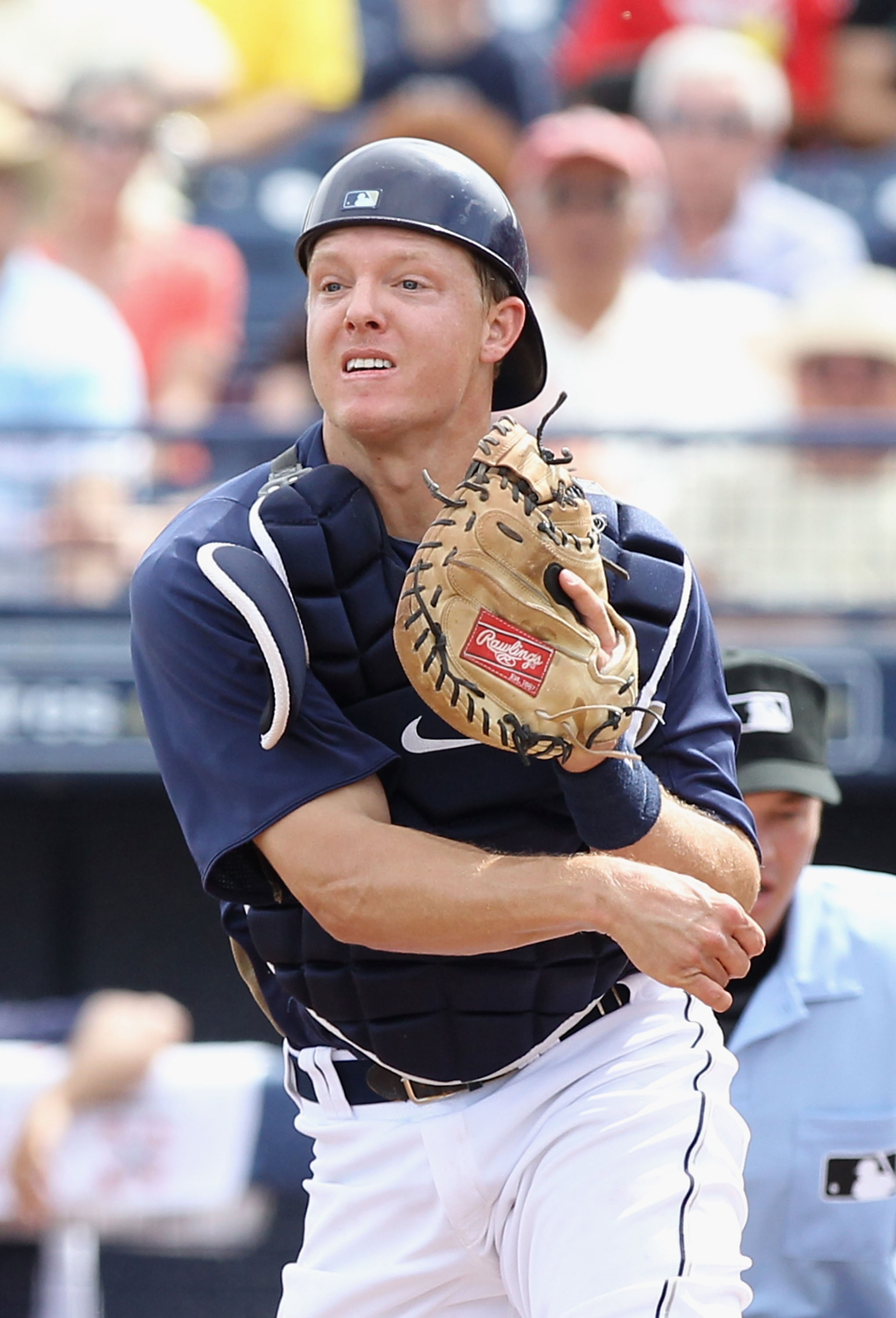 PEORIA, AZ - MARCH 15: Catcher Nick Hundley #4 of the San Diego Padres throws to third base against the Los Angeles Angels of Anaheim during the spring training game at Peoria Stadium on March 15, 2011 in Peoria, Arizona. (Photo by Christian Petersen/Ge PEORIA, AZ - MARCH 15: Catcher Nick Hundley #4 of the San Diego Padres throws to third base against the Los Angeles Angels of Anaheim during the spring training game at Peoria Stadium on March 15, 2011 in Peoria, Arizona. (Photo by Christian Petersen/Ge