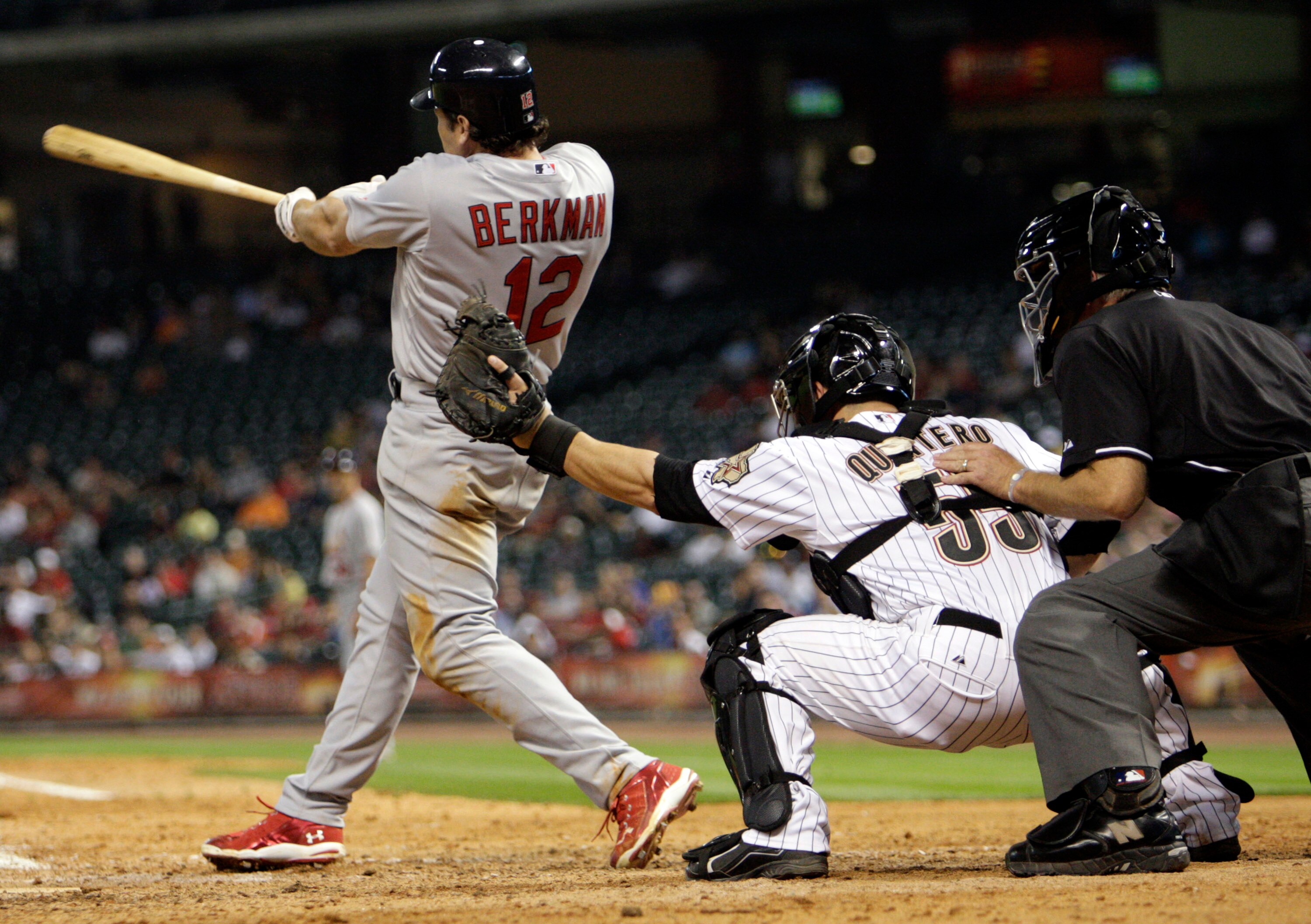 HOUSTON - APRIL 26:  Lance Berkman #12 of the St. Louis Cardinals doubles to center field in the ninth scoring Matt Holliday with the go ahead run at Minute Maid Park on April 26, 2011 in Houston, Texas. Houston won 6-5. (Photo by Bob Levey/Getty Images)