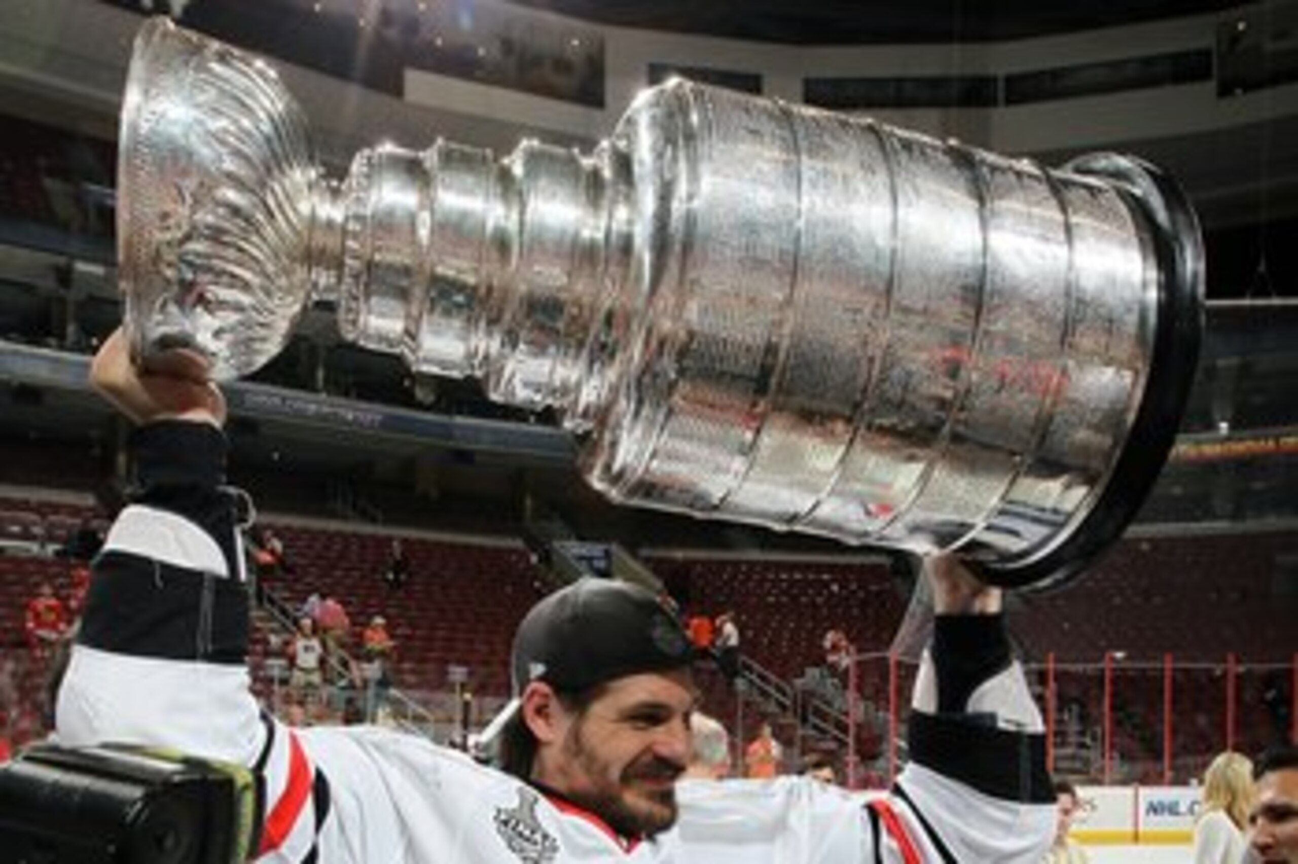 PHILADELPHIA - JUNE 09:  Brent Sopel #5 of the Chicago Blackhawks hoists the Stanley Cup after teammate Patrick Kane scored the game-winning goal in overtime to defeat the Philadelphia Flyers 4-3 and win the Stanley Cup in Game Six of the 2010 NHL Stanley