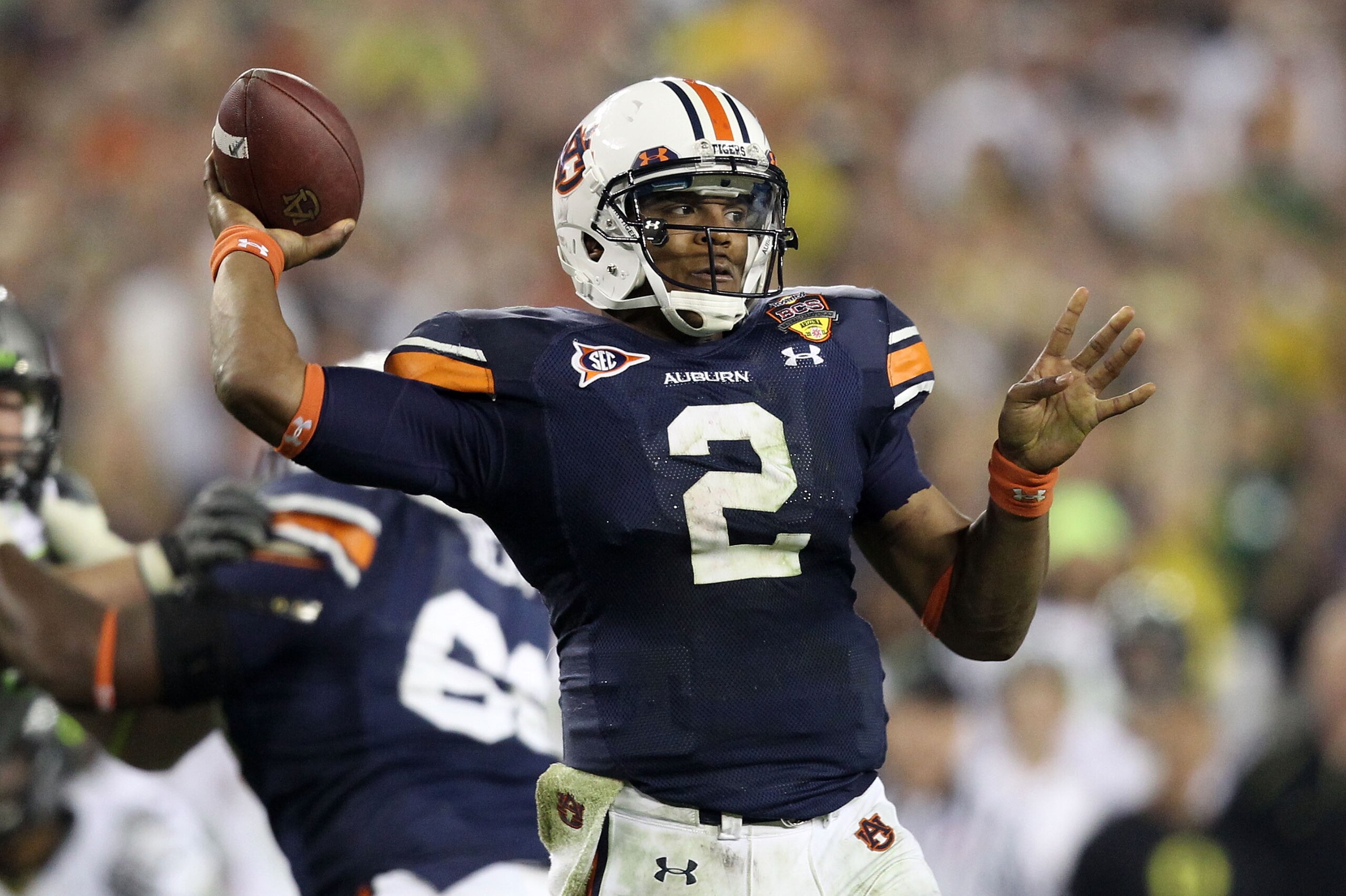 GLENDALE, AZ - JANUARY 10: Cameron Newton #2 of the Auburn Tigers scrambles against the Oregon Ducks during the Tostitos BCS National Championship Game at University of Phoenix Stadium on January 10, 2011 in Glendale, Arizona. (Photo by Christian Peters GLENDALE, AZ - JANUARY 10: Cameron Newton #2 of the Auburn Tigers scrambles against the Oregon Ducks during the Tostitos BCS National Championship Game at University of Phoenix Stadium on January 10, 2011 in Glendale, Arizona. (Photo by Christian Peters