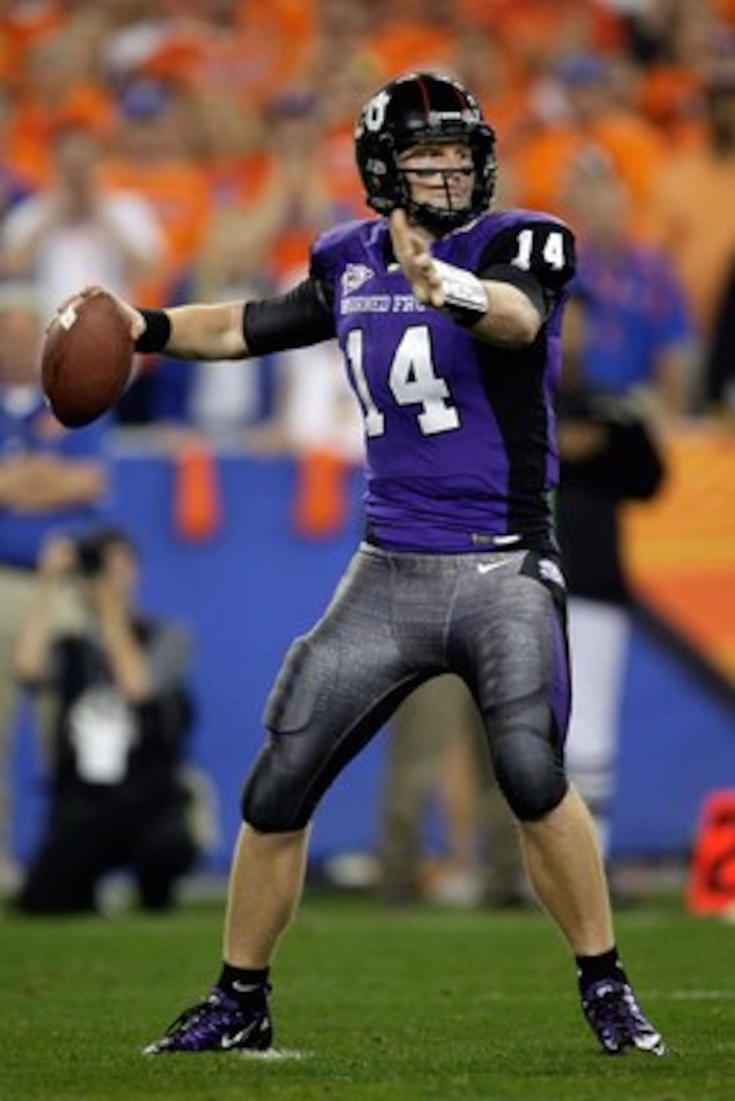 GLENDALE, AZ - JANUARY 04:  Quarterback Andy Dalton #14 of the TCU Horned Frogs passes the ball against the Boise State Broncos during the Tostitos Fiesta Bowl at the Universtity of Phoenix Stadium on January 4, 2010 in Glendale, Arizona.  (Photo by Jamie