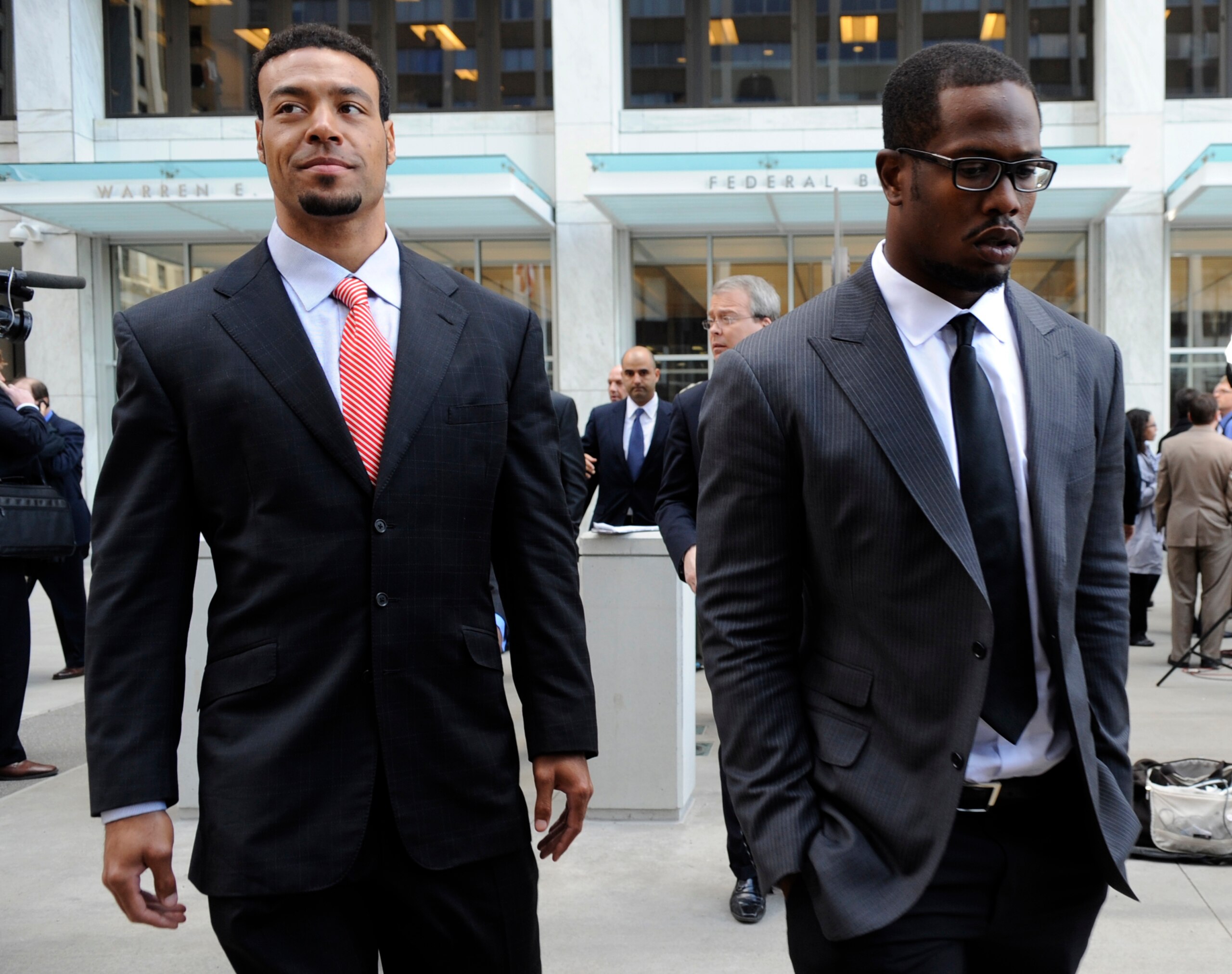 SAINT PAUL, MN - APRIL 6: Wide receiver Vincent Jackson (L) of the San Diego Chargers and linebacker Von Miller of Texas A&M, who is entered in this year's NFL draft, leave following a hearing at the U.S. Courthouse on April 6, 2011 in Saint Paul, Minneso