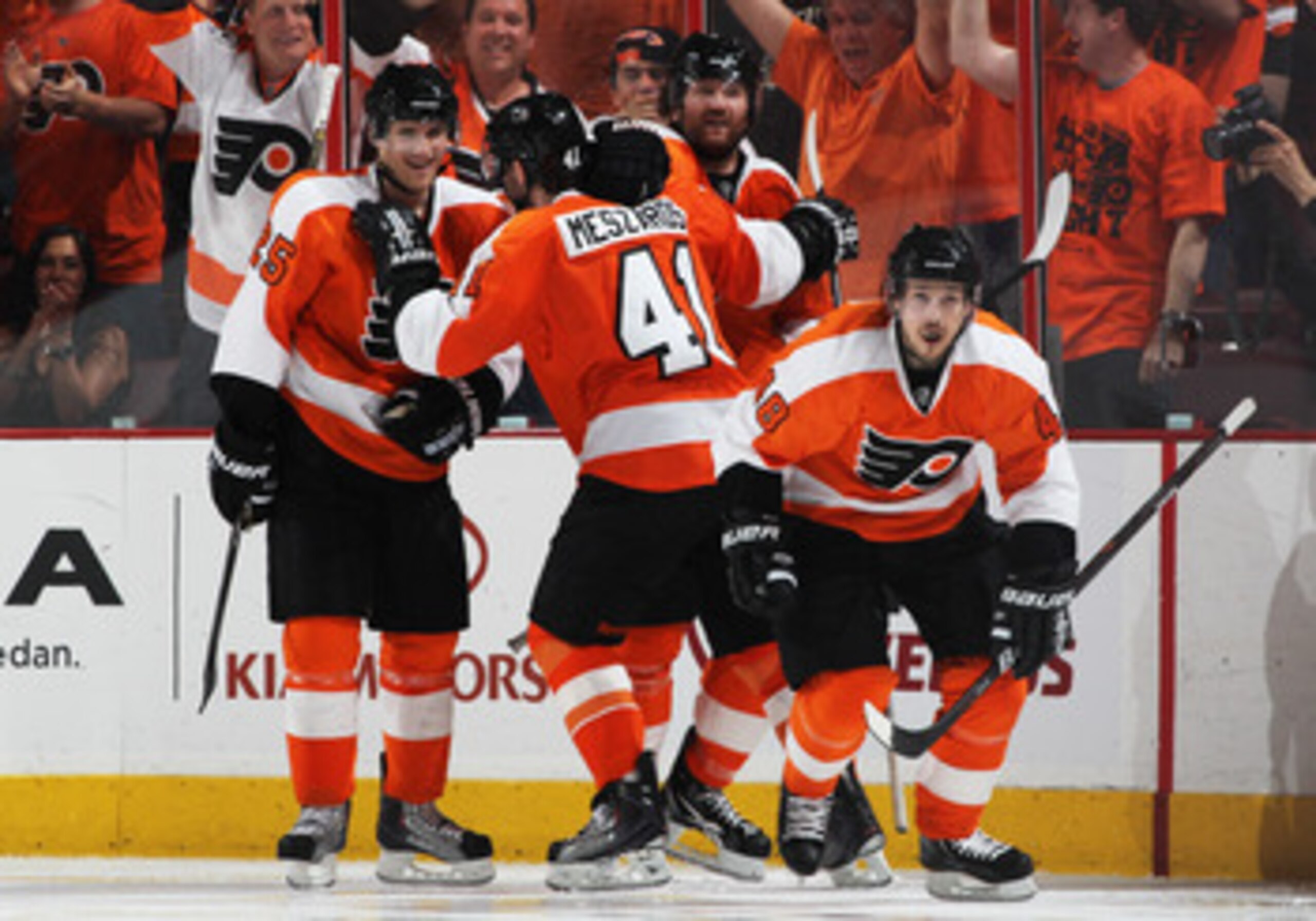 PHILADELPHIA, PA - APRIL 26:  Ville Leino #22 celebrates his third period goal against the Buffalo Sabres with teammates Danny Briere #48 and Andrej Meszaros #41 of Philadelphia Flyers and in Game Seven of the Eastern Conference Quarterfinals during the 2