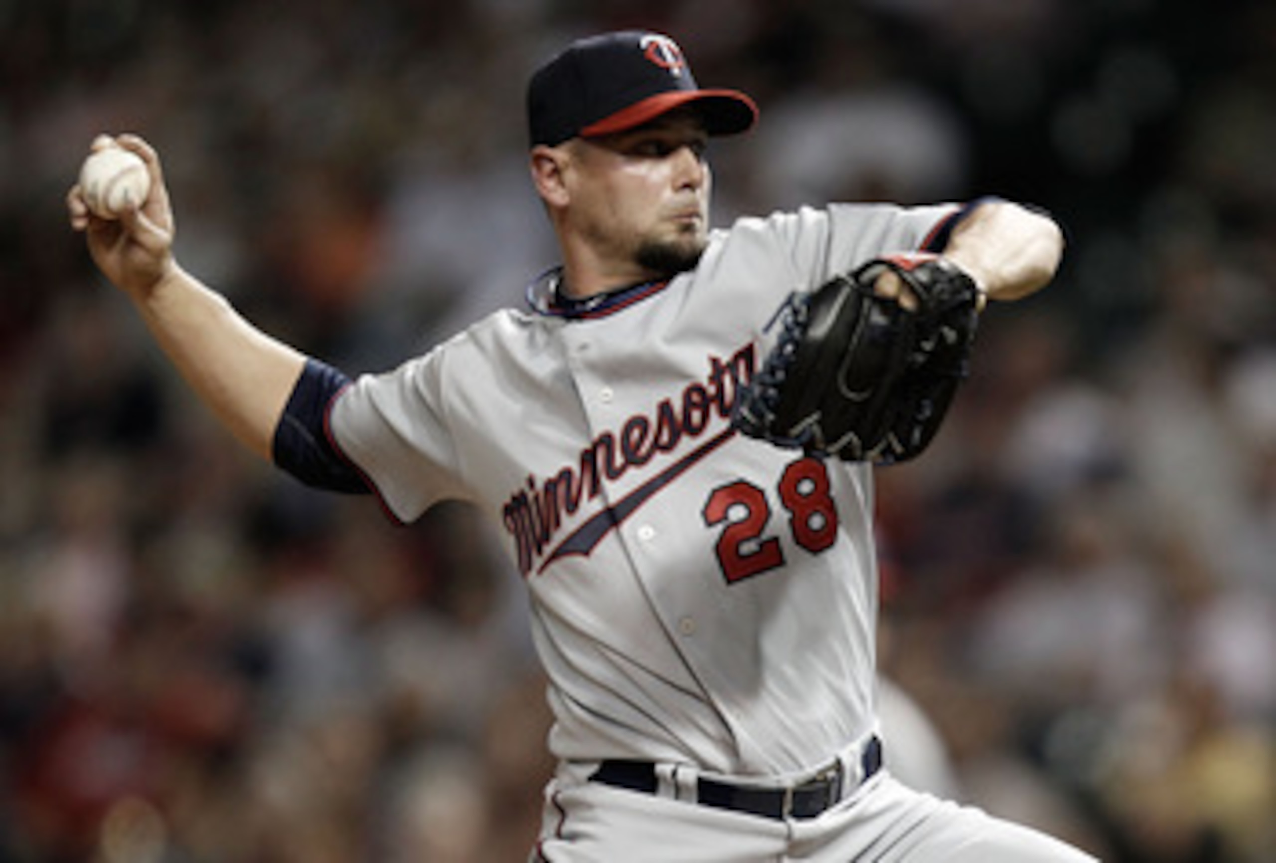 CLEVELAND, OH- APRIL 30: Jesse Crain #28 of the Minnesota Twins pitches against the Cleveland Indians during the game on April 30, 2010 at Progressive Field in Cleveland, Ohio.  (Photo by Jared Wickerham/Getty Images)