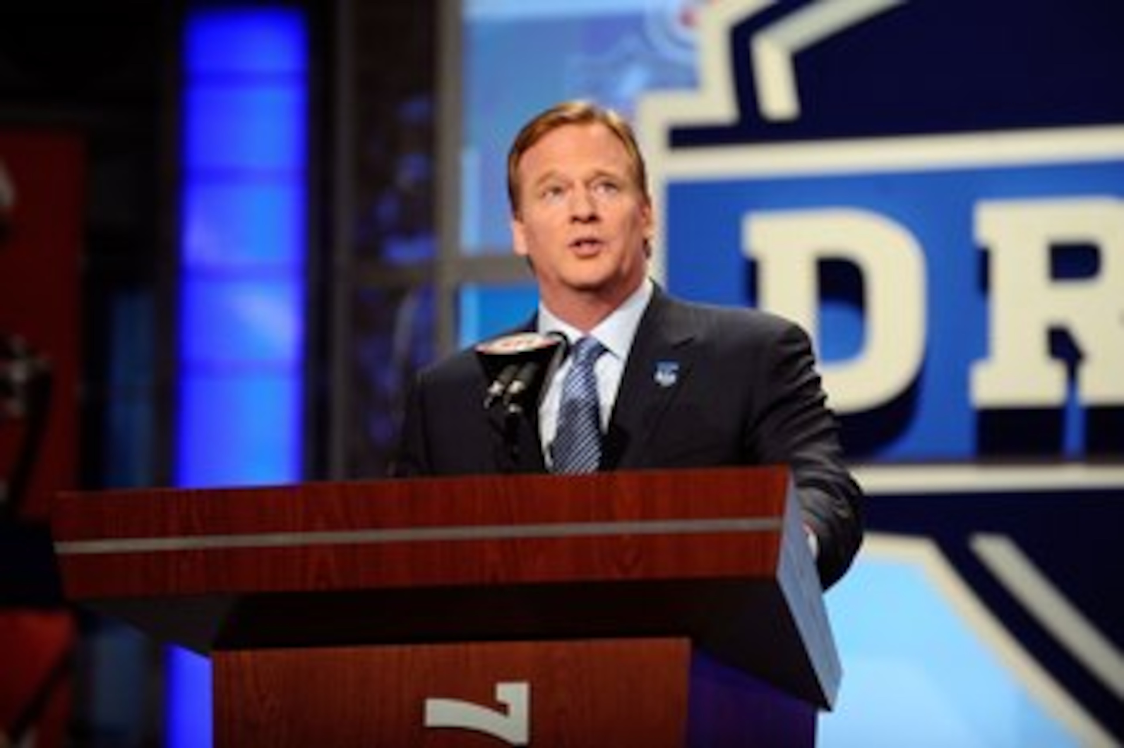 NEW YORK - APRIL 22: NFL Commissioner Roer Goodell speaks at the podium during the first round of the 2010 NFL Draft at Radio City Music Hall on April 22, 2010 in New York City. (Photo by Jeff Zelevansky/Getty Images) NEW YORK - APRIL 22: NFL Commissioner Roer Goodell speaks at the podium during the first round of the 2010 NFL Draft at Radio City Music Hall on April 22, 2010 in New York City. (Photo by Jeff Zelevansky/Getty Images)