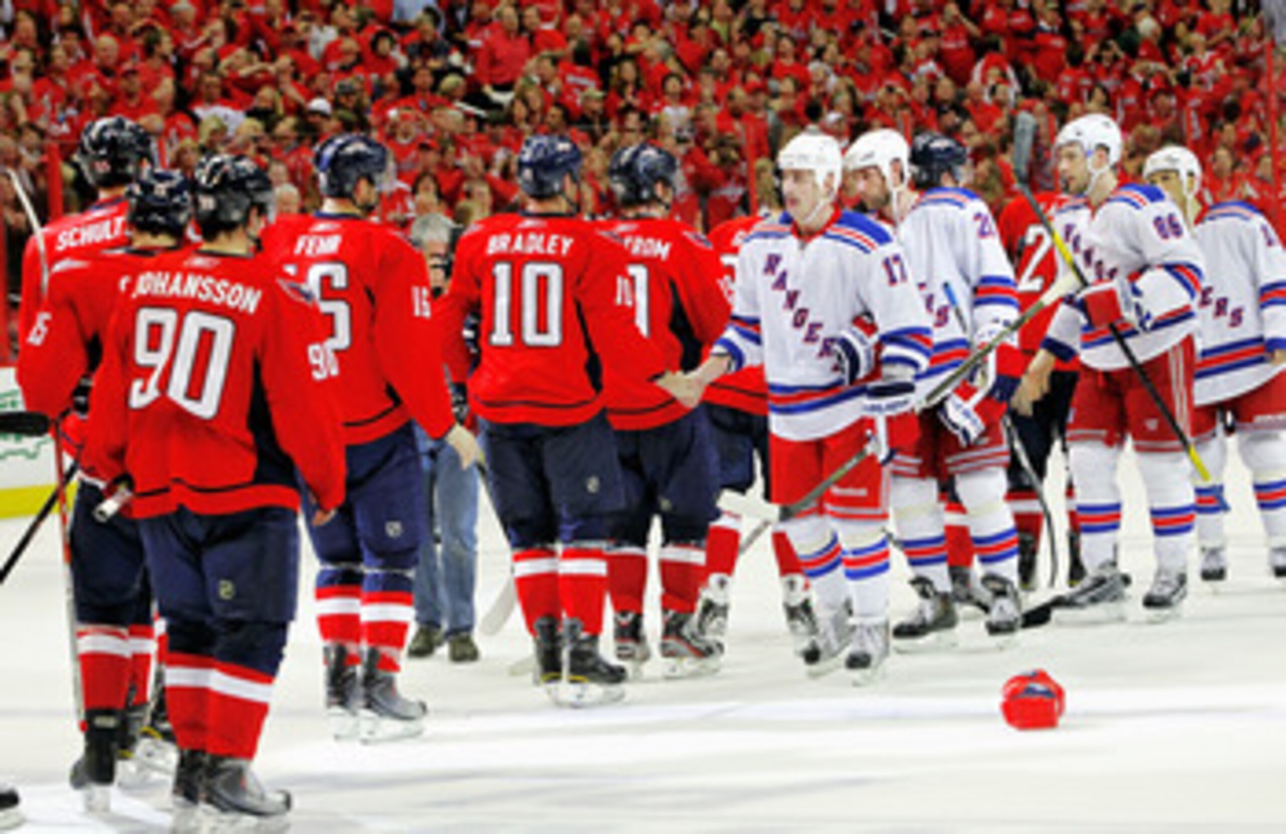 WASHINGTON , DC - APRIL 23:  Matt Bradley #10 of the Washington Capitals greets Brandon Dubinsky #17 of the New York Rangers during the handshake following a 3-1 win over the Rangers in Game Five of the Eastern Conference Quarterfinals during the 2011 NHL