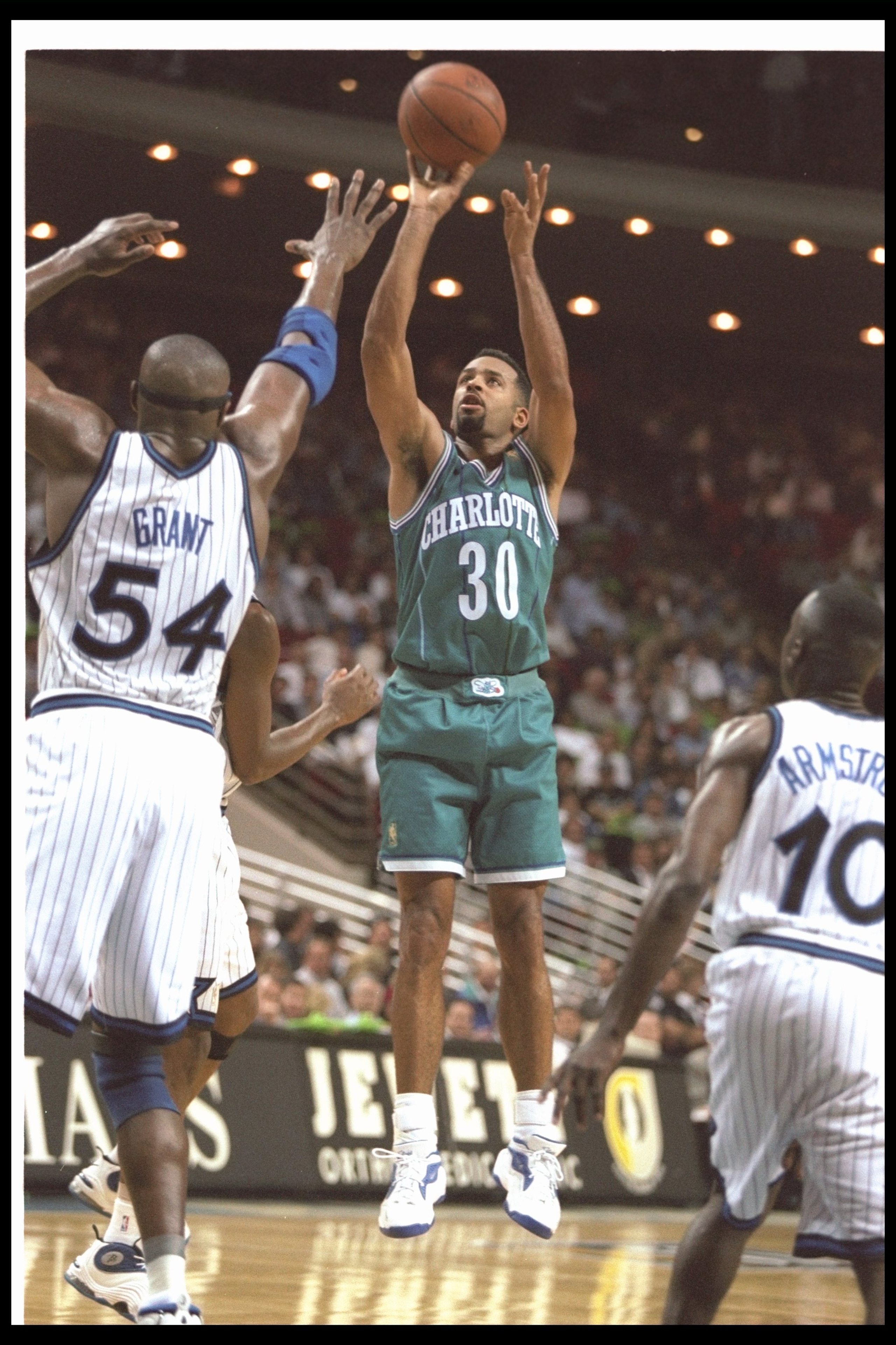 14 Nov 1996: Guard Dell Curry of the Charlotte Hornets shoots the ball during a game against the Orlando Magic at the Orlando Arena in Orlando, Florida. The Magic won the game, 96-89.