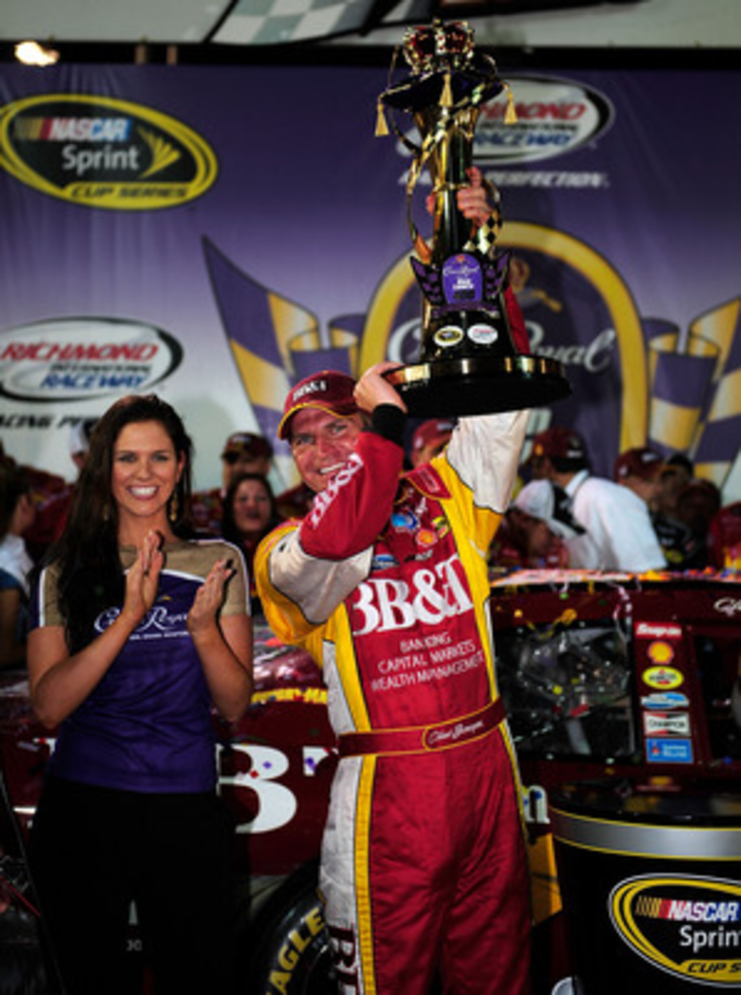 RICHMOND, VA - MAY 03:  Clint Bowyer, driver of the #07 BB&T Chevrolet, celebrates winning the NASCAR Sprint Cup Series Crown Royal Presents the Dan Lowry 400 in victory lane at Richmond International Raceway on May 3, 2008 in Richmond, Virginia.  (Photo 