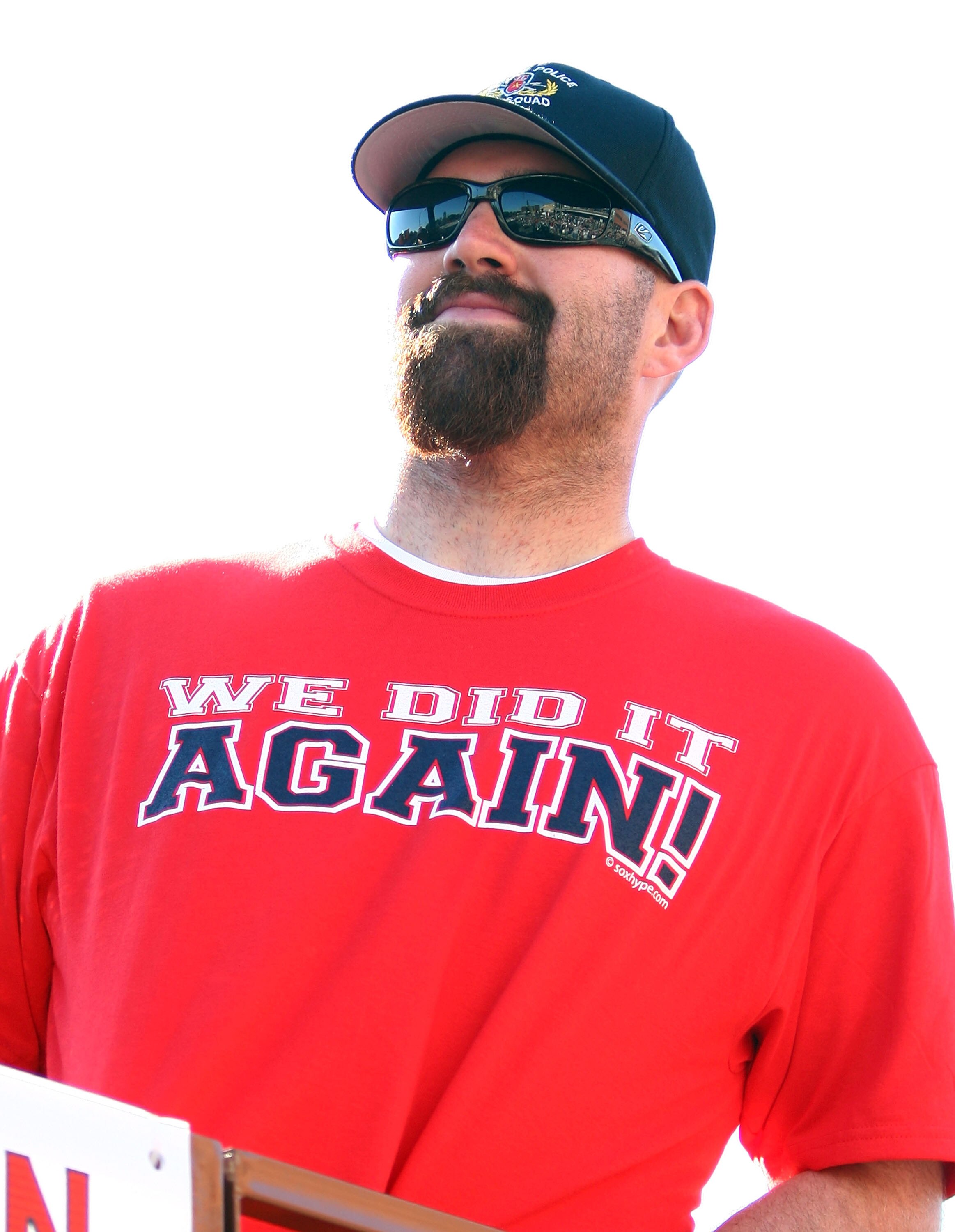BOSTON - OCTOBER 30:  Kevin Youkilis looks down from his duck boat during the Boston Red Sox World Series victory celebration on October 30, 2007 in Boston, Massachusetts  (Photo by Elsa/Getty Images)