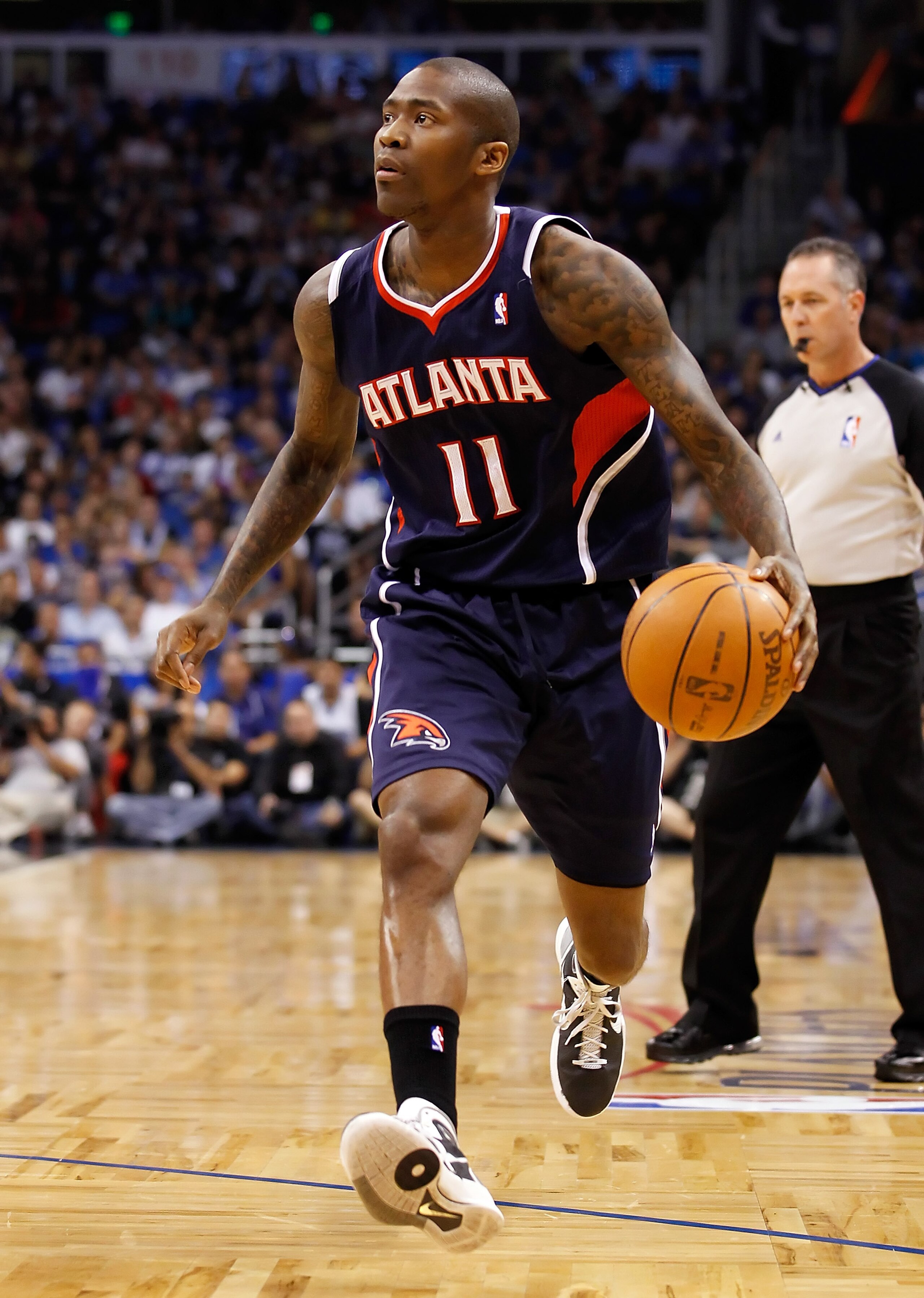ORLANDO, FL - APRIL 26:  Jamal Crawford #11 of the Atlanta Hawks drives against the Orlando Magic during Game Five of the Eastern Conference Quarterfinals of the 2011 NBA Playoffs on April 26, 2011 at the Amway Arena in Orlando, Florida.  NOTE TO USER: Us