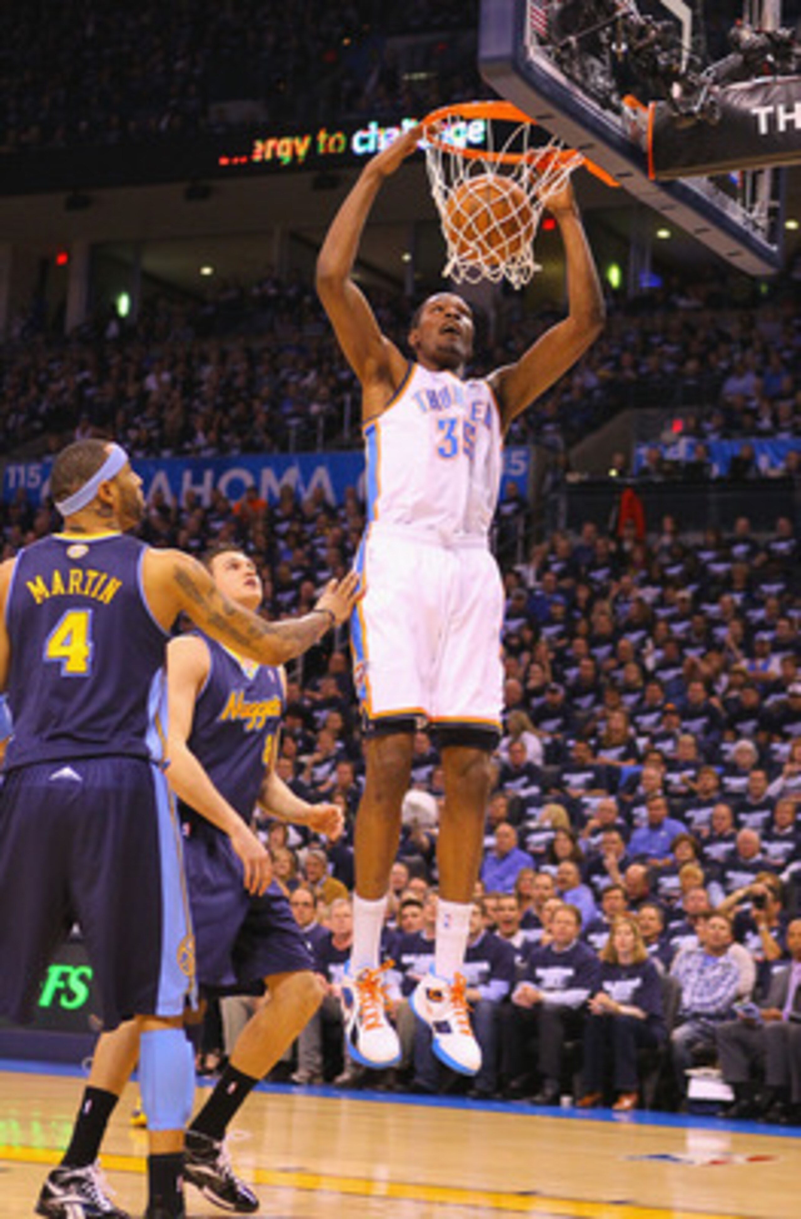 OKLAHOMA CITY, OK - APRIL 27: Kevin Durant #35 of the Oklahoma City Thunder dunks the ball against the Denver Nuggets in Game Five of the Western Conference Quarterfinals in the 2011 NBA Playoffs on April 27, 2011 at the Ford Center in Oklahoma City, Okla
