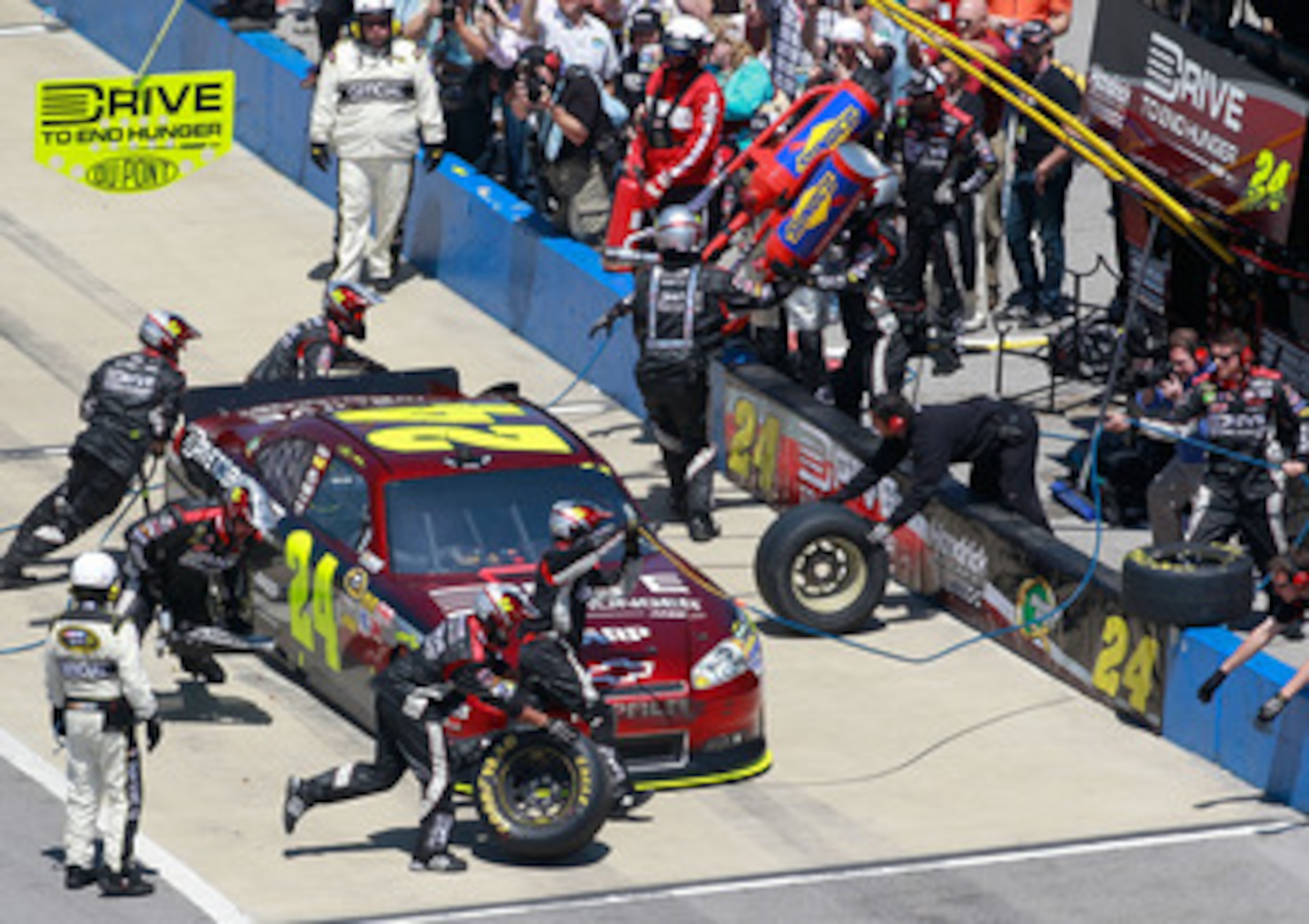 TALLADEGA, AL - APRIL 17:  Jeff Gordon, driver of the #24 Drive to End Hunger/AARP Chevrolet, pits during the NASCAR Sprint Cup Series Aaron's 499 at Talladega Superspeedway on April 17, 2011 in Talladega, Alabama.  (Photo by Jerry Markland/Getty Images f