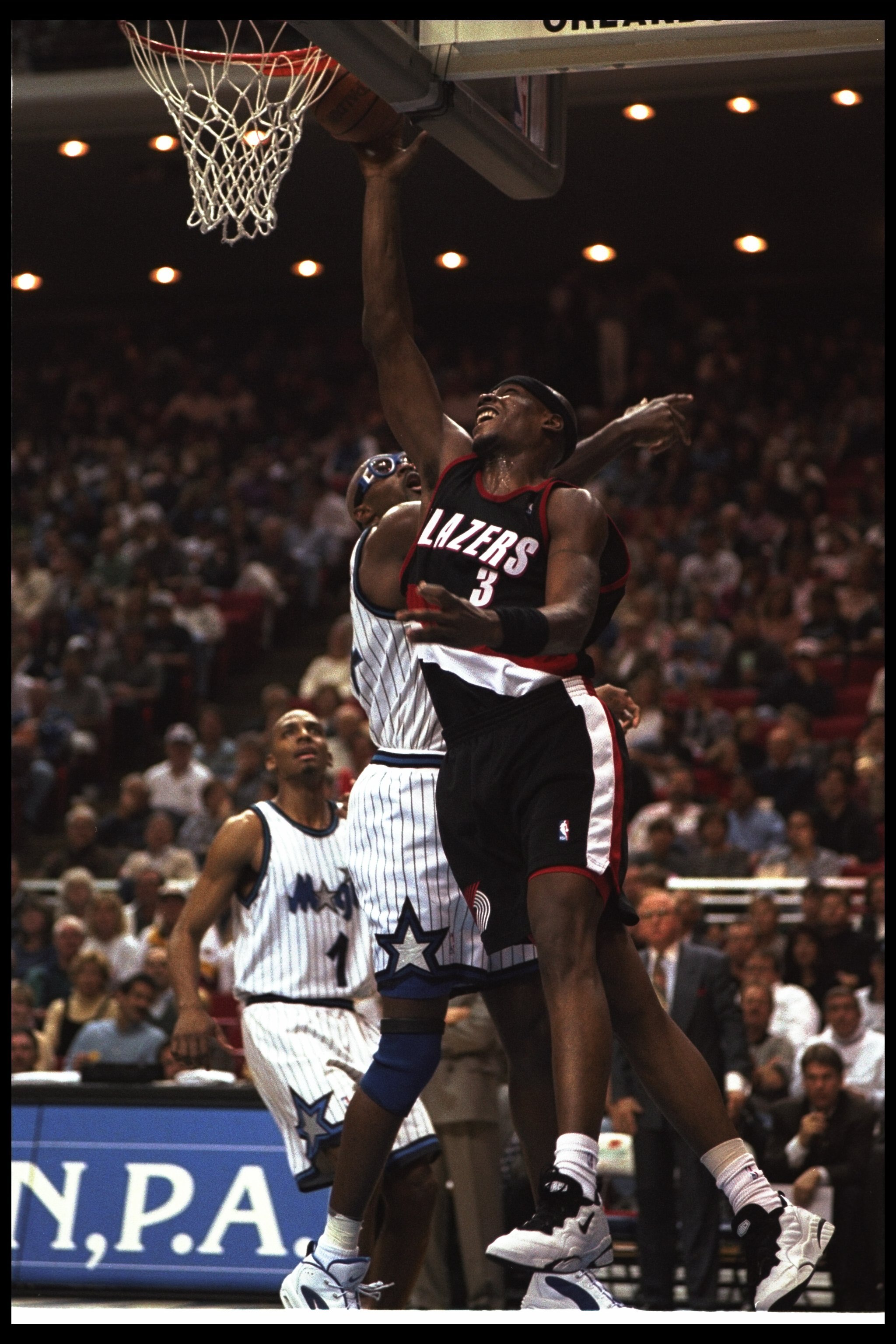 3 Feb 1996: Forward Horace Grant of the Orlando Magic works against forward Clifford Robinson of the Portland Trail Blazers during a game played at the Orlando Arena in Orlando, Florida. The Magic won the game, 115-89.
