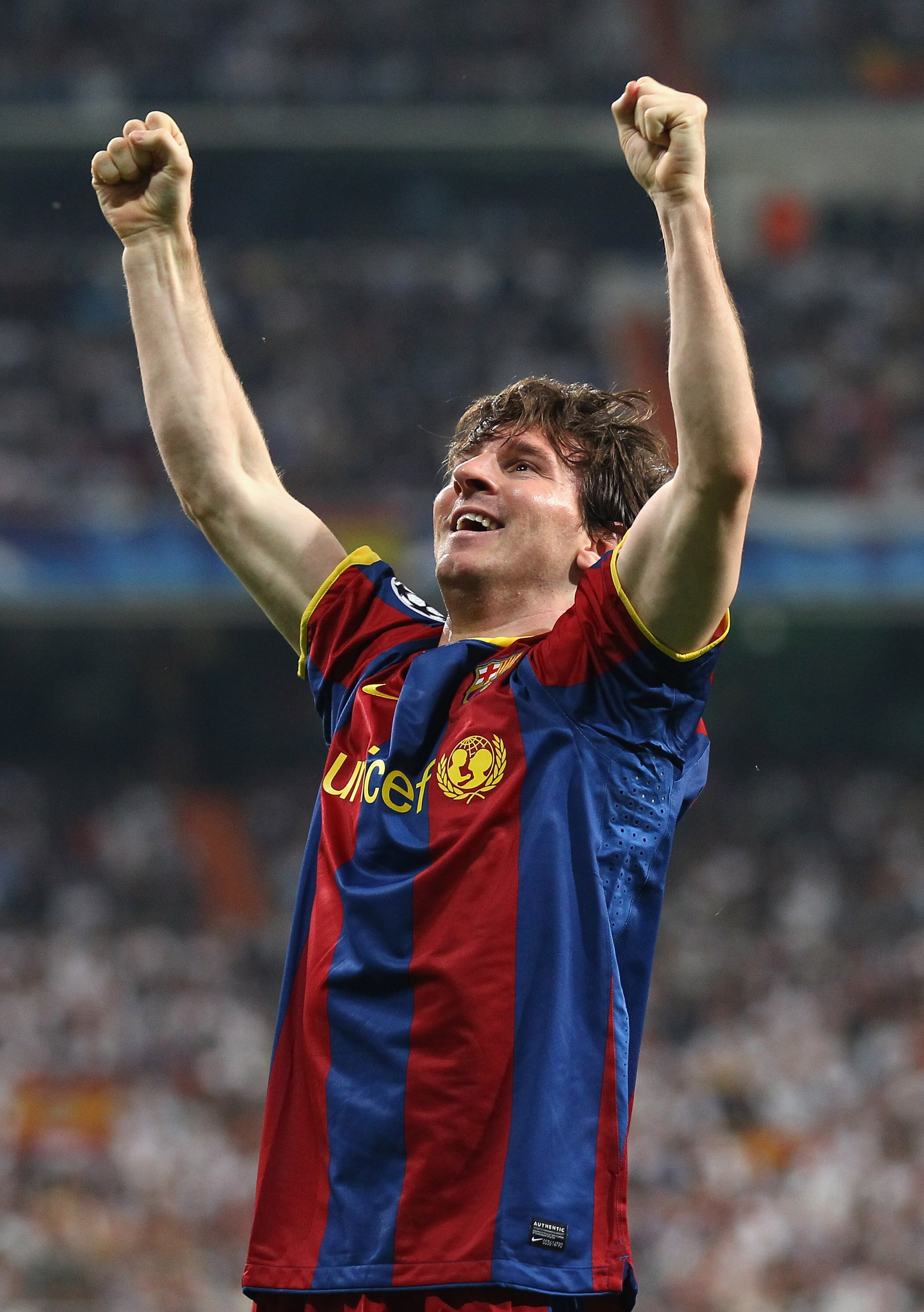 MADRID, SPAIN - APRIL 27:  Lionel Messi of Barcelona celebrates after scoring his first goal during the UEFA Champions League Semi Final first leg match between Real Madrid and Barcelona at Estadio Santiago Bernabeu on April 27, 2011 in Madrid, Spain.  (P