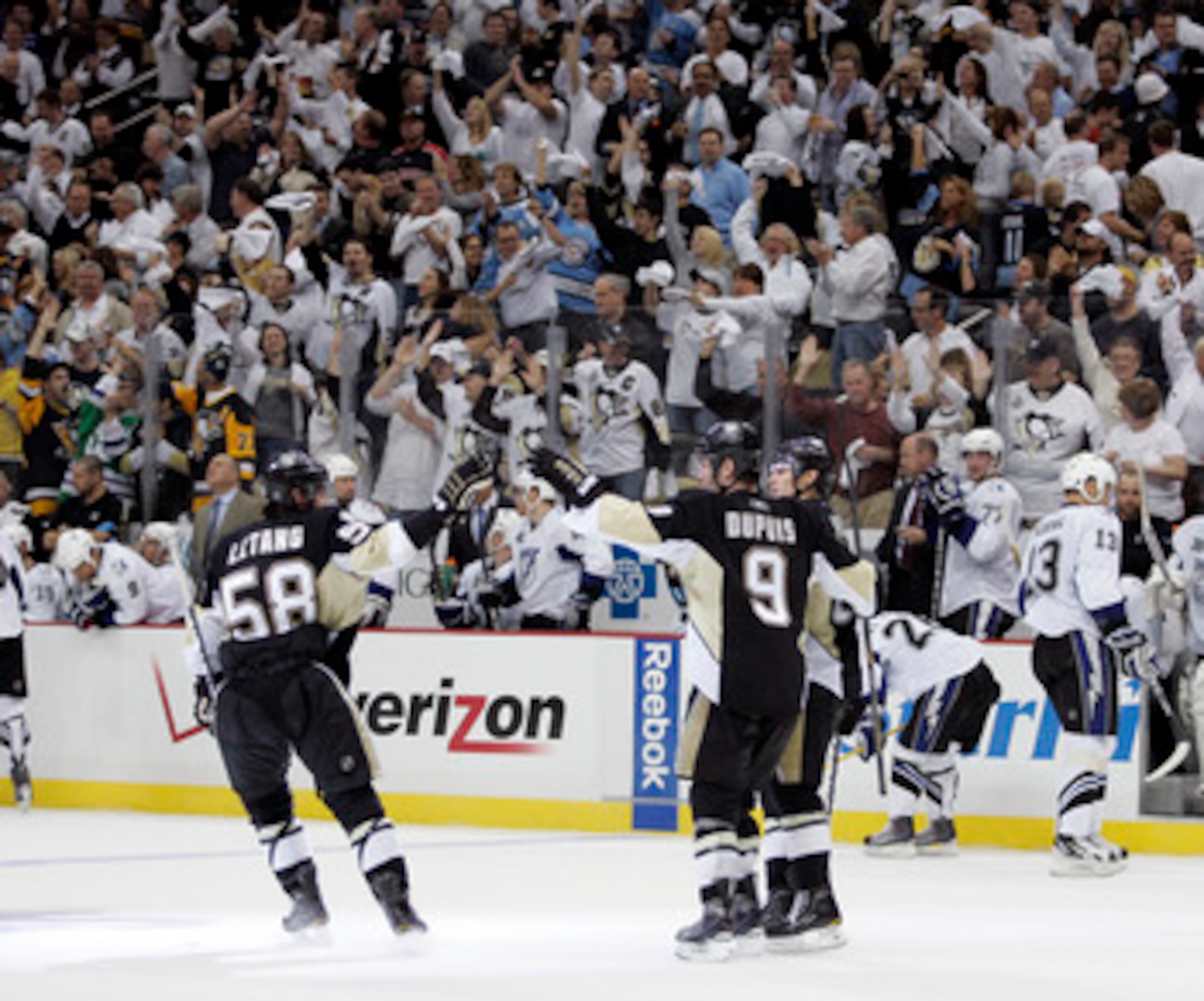 PITTSBURGH, PA - APRIL 13: Chris Kunitz #14 of the Pittsburgh Penguins celebrates his empty net goal against the Tampa Bay Lightning in Game One of the Eastern Conference Quarterfinals during the 2011 NHL Stanley Cup Playoffs at Consol Energy Center on Ap