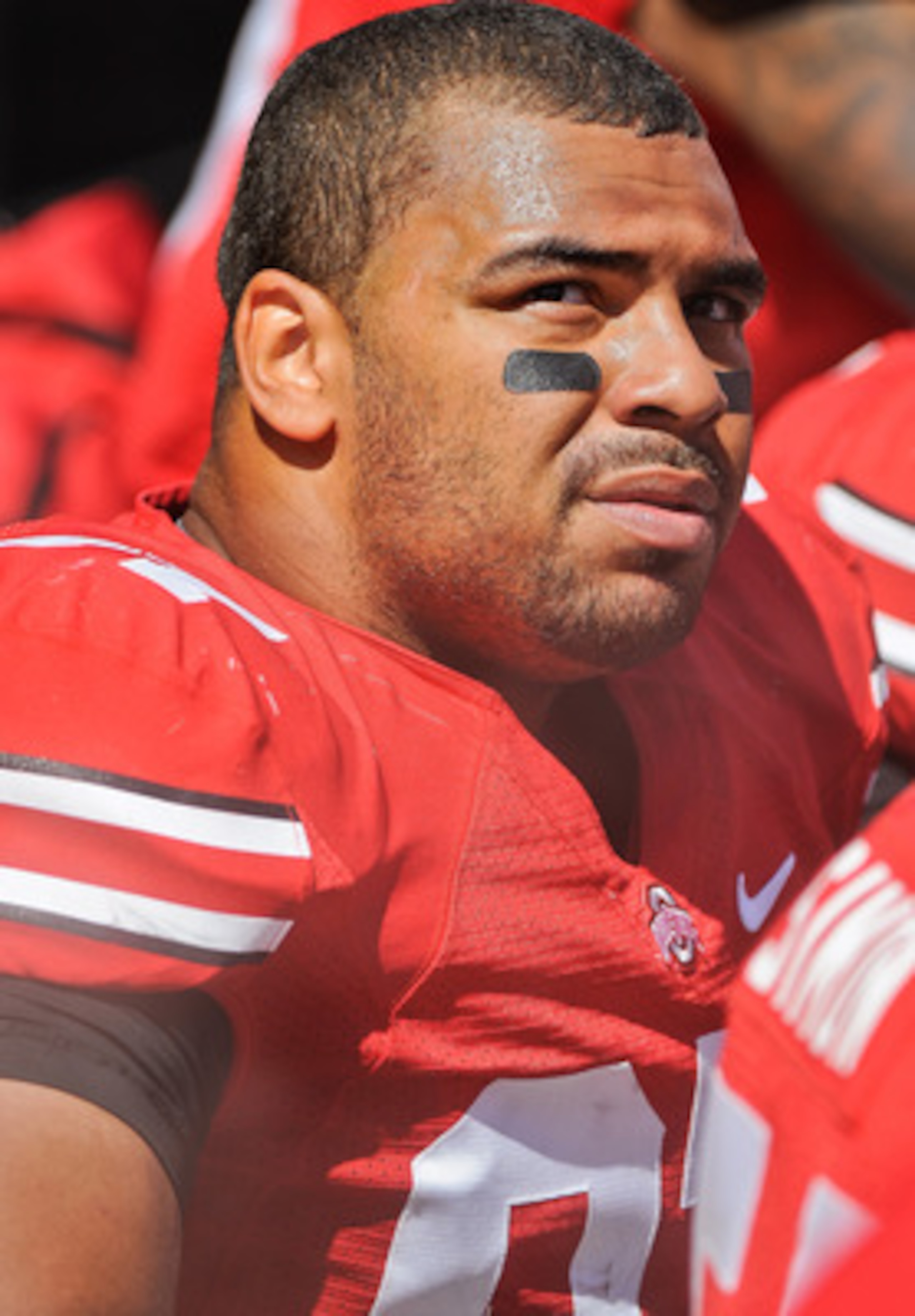 COLUMBUS, OH - SEPTEMBER 18:  Cameron Heyward #97 of the Ohio State Buckeyes takes a breather on the sideline during a game against the Ohio Bobcats at Ohio Stadium on September 18, 2010 in Columbus, Ohio.  (Photo by Jamie Sabau/Getty Images)