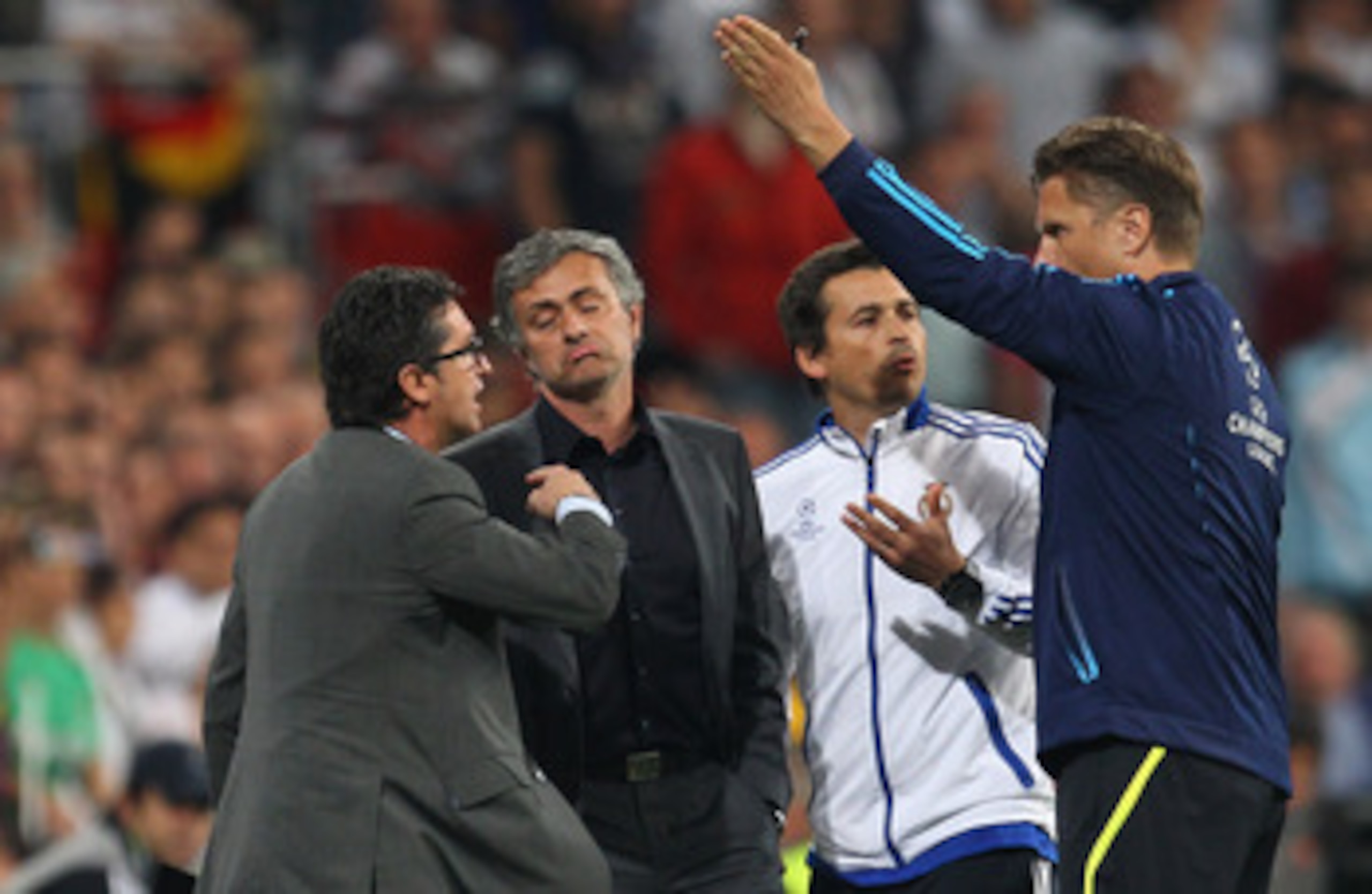 MADRID, SPAIN - APRIL 27:  Jose Mourinho the coach of Real Madrid is sent off to the stands by Thorsten Kinhofer the fourth official during the UEFA Champions League Semi Final first leg match between Real Madrid and Barcelona at Estadio Santiago Bernabeu