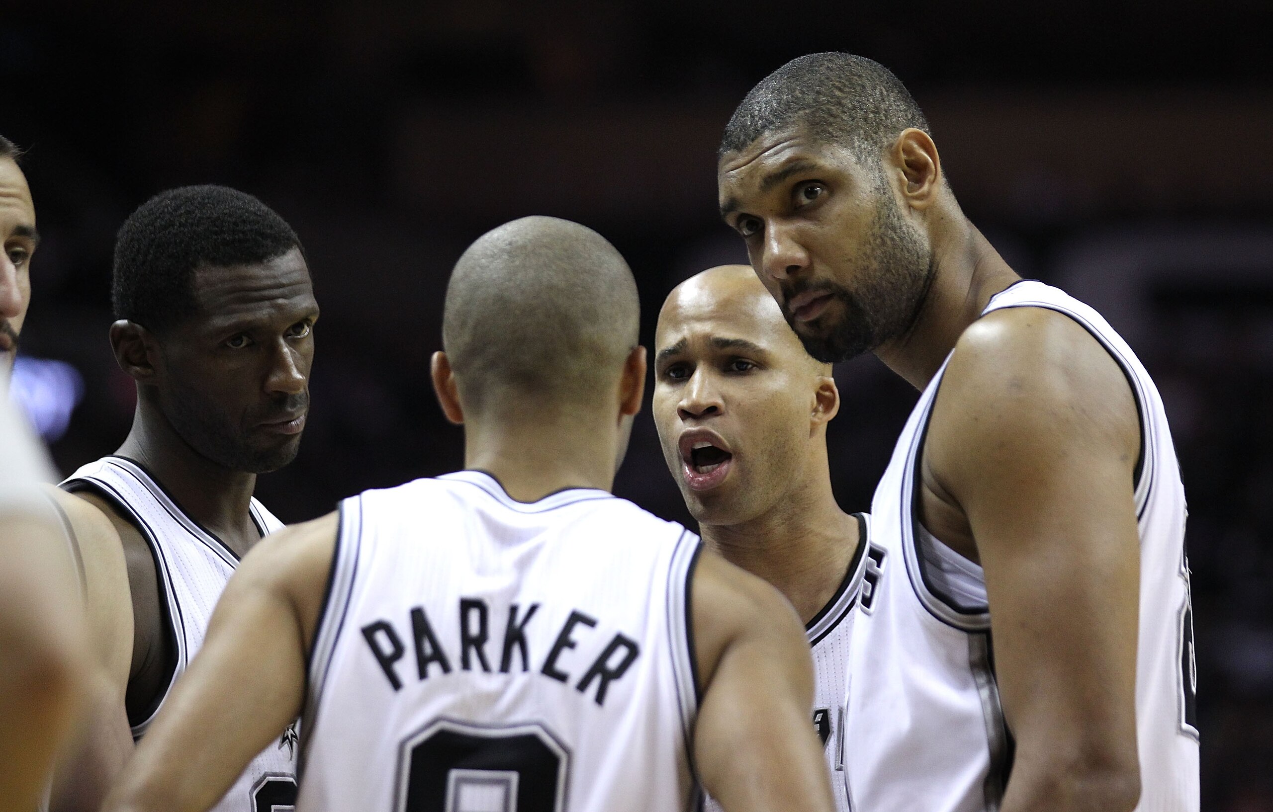 SAN ANTONIO, TX - APRIL 27:  Tim Duncan #21 of the San Antionio Spurs looks on with his teammates against the Memphis Grizzlies in Game Five of the Western Conference Quarterfinals in the 2011 NBA Playoffs on April 27, 2011 at AT&T Center in San Antonio, 