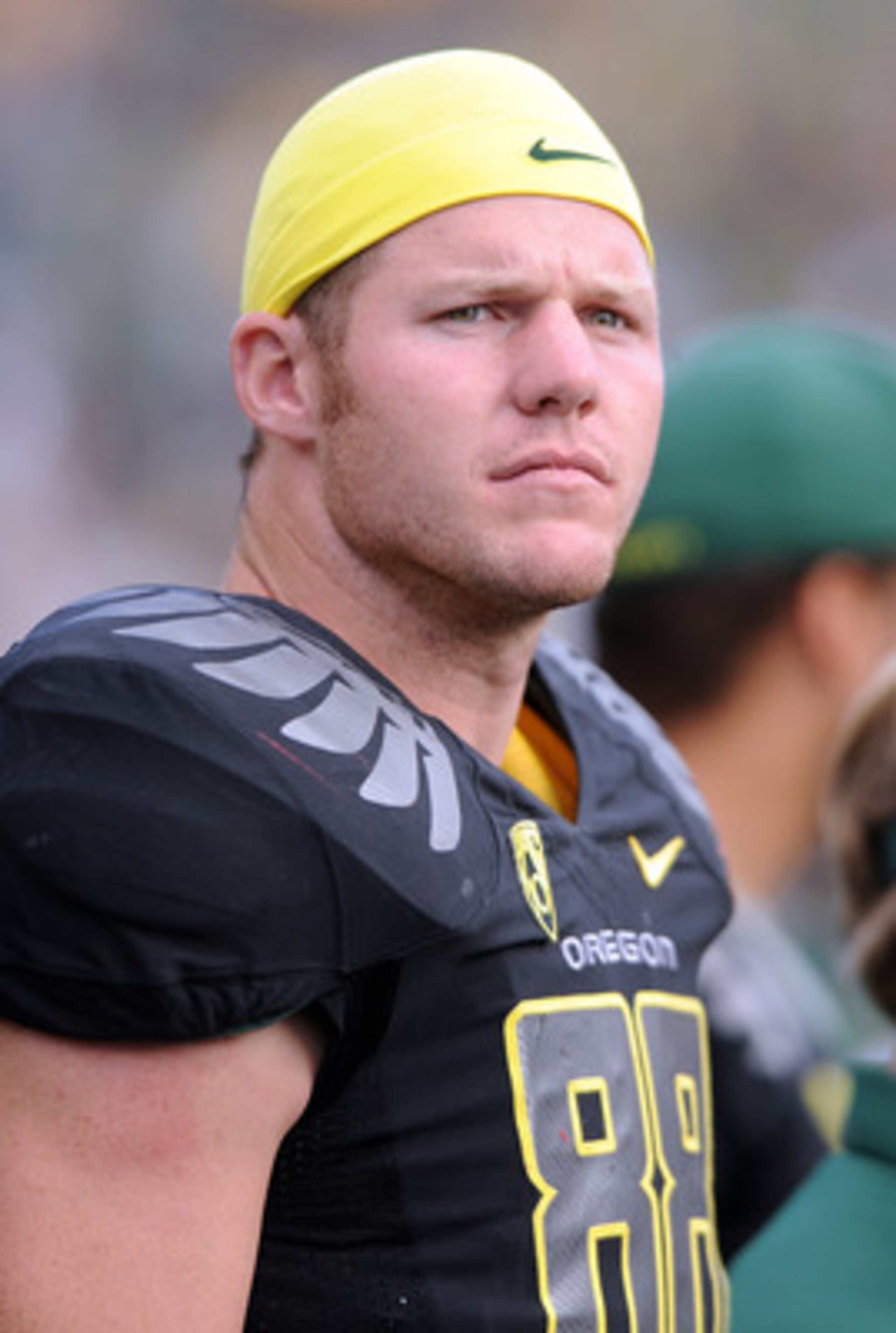 EUGENE, OR - SEPTEMBER 04: Defensive tackle Brandon Bair #88 of the Oregon Ducks watches the action from the sidelines in the third quarter of the game against the New Mexico Lobos at Autzen Stadium on September 4, 2010 in Eugene, Oregon. Oregon won the g EUGENE, OR - SEPTEMBER 04: Defensive tackle Brandon Bair #88 of the Oregon Ducks watches the action from the sidelines in the third quarter of the game against the New Mexico Lobos at Autzen Stadium on September 4, 2010 in Eugene, Oregon. Oregon won the g