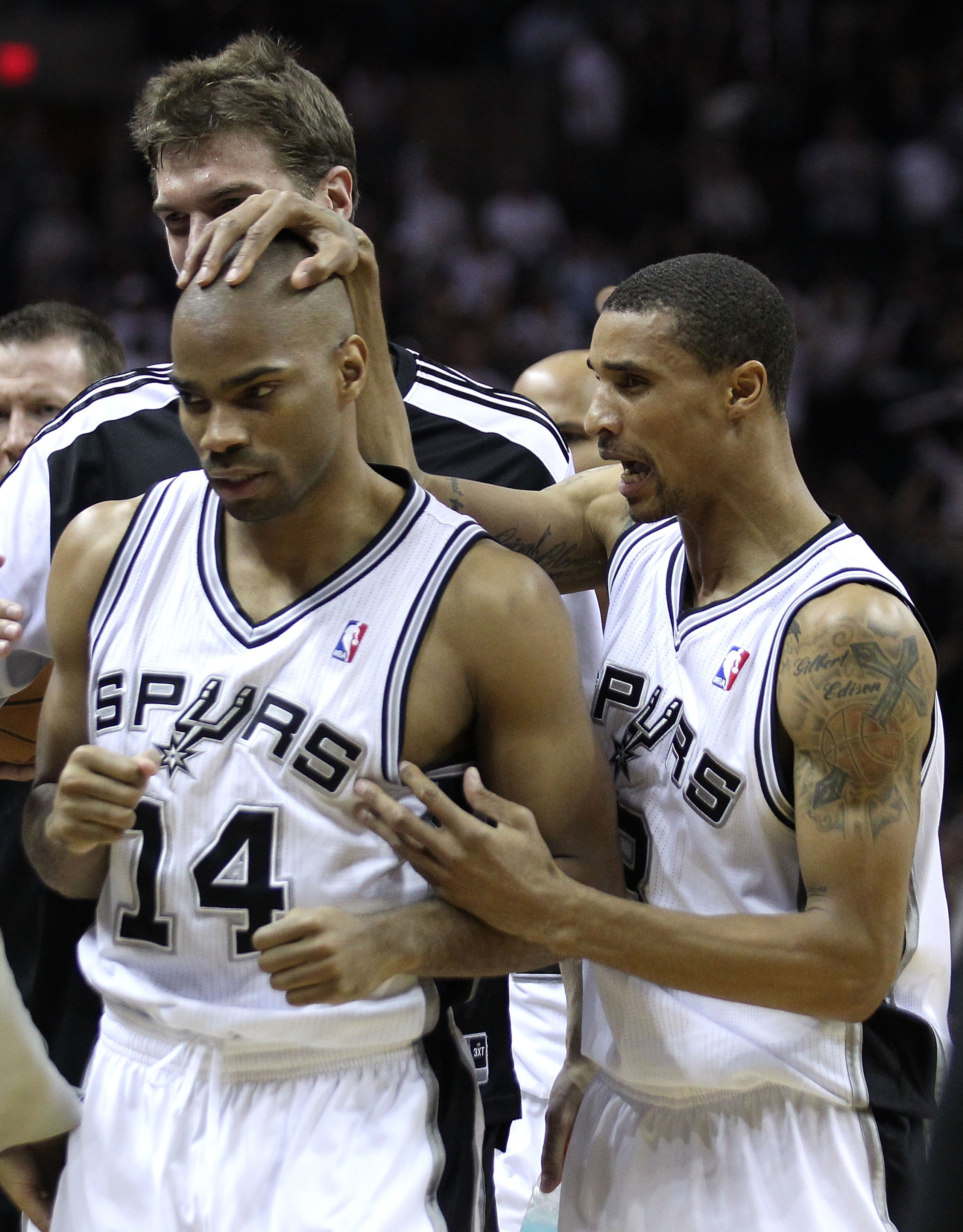 SAN ANTONIO, TX - APRIL 27:  Gary Neal #14 of the San Antionio Spurs celebrates with George Hill #3 after hitting a three pointer at the end of regulation to tie the game against the Memphis Grizzlies in Game Five of the Western Conference Quarterfinals i
