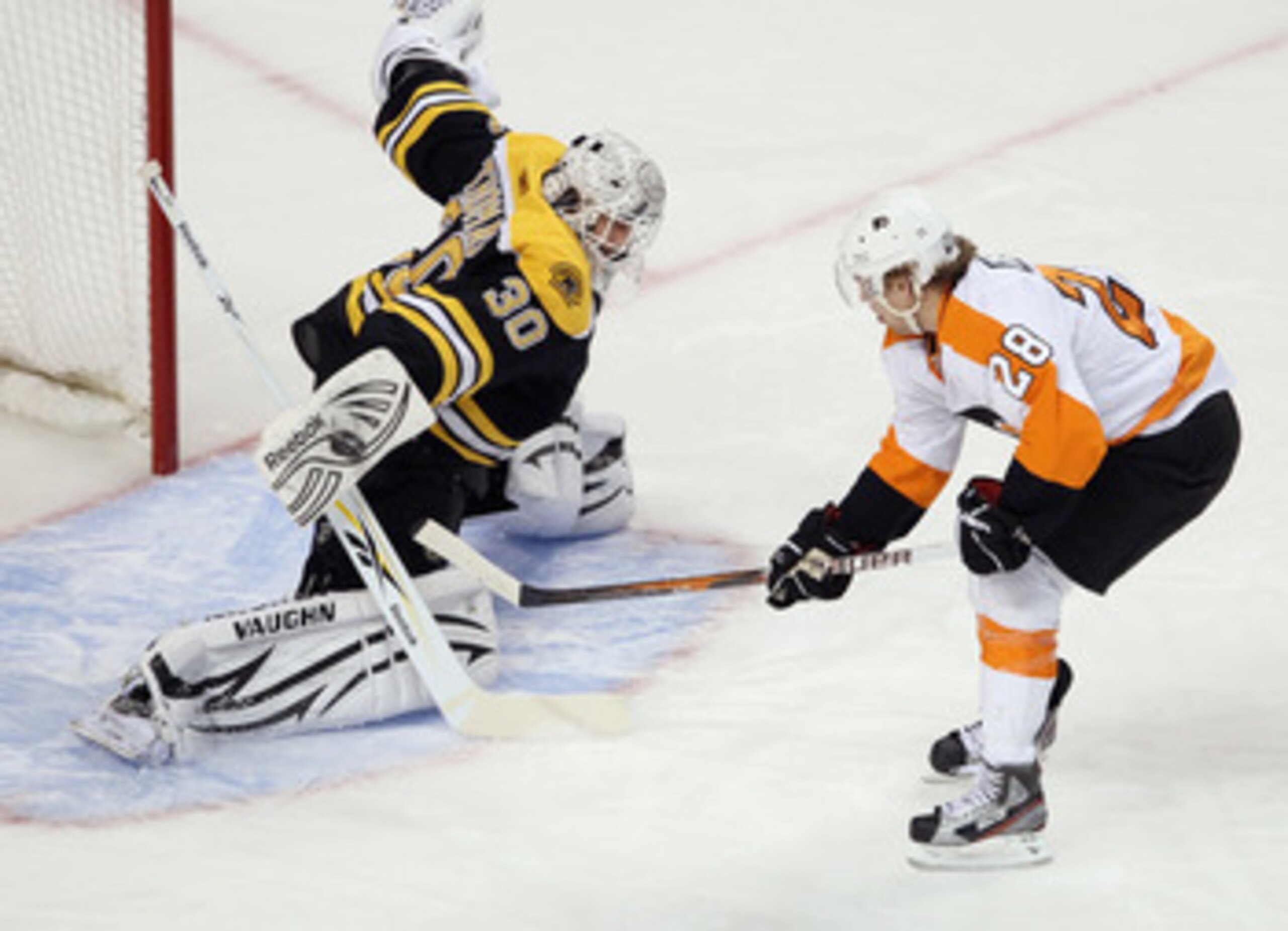 BOSTON, MA - JANUARY 13:  Tim Thomas #30 of the Boston Bruins stops a shot by Claude Giroux #28 of the Philadelphia Flyers on January 11, 2011 at the TD Garden in Boston, Massachusetts.  (Photo by Elsa/Getty Images)