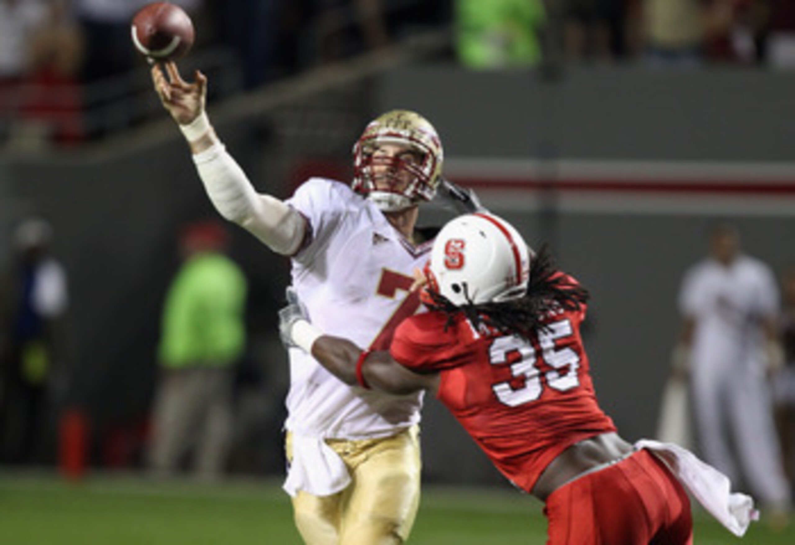 RALEIGH, NC - OCTOBER 28: Christian Ponder #7 of the Florida State Seminoles drops back to throw a pass in pressure with Terrell Manning #35 of the North Carolina State Wolfpack giving chase during their game at Carter-Finley Stadium on October 28, 2010 RALEIGH, NC - OCTOBER 28: Christian Ponder #7 of the Florida State Seminoles drops back to throw a pass in pressure with Terrell Manning #35 of the North Carolina State Wolfpack giving chase during their game at Carter-Finley Stadium on October 28, 2010