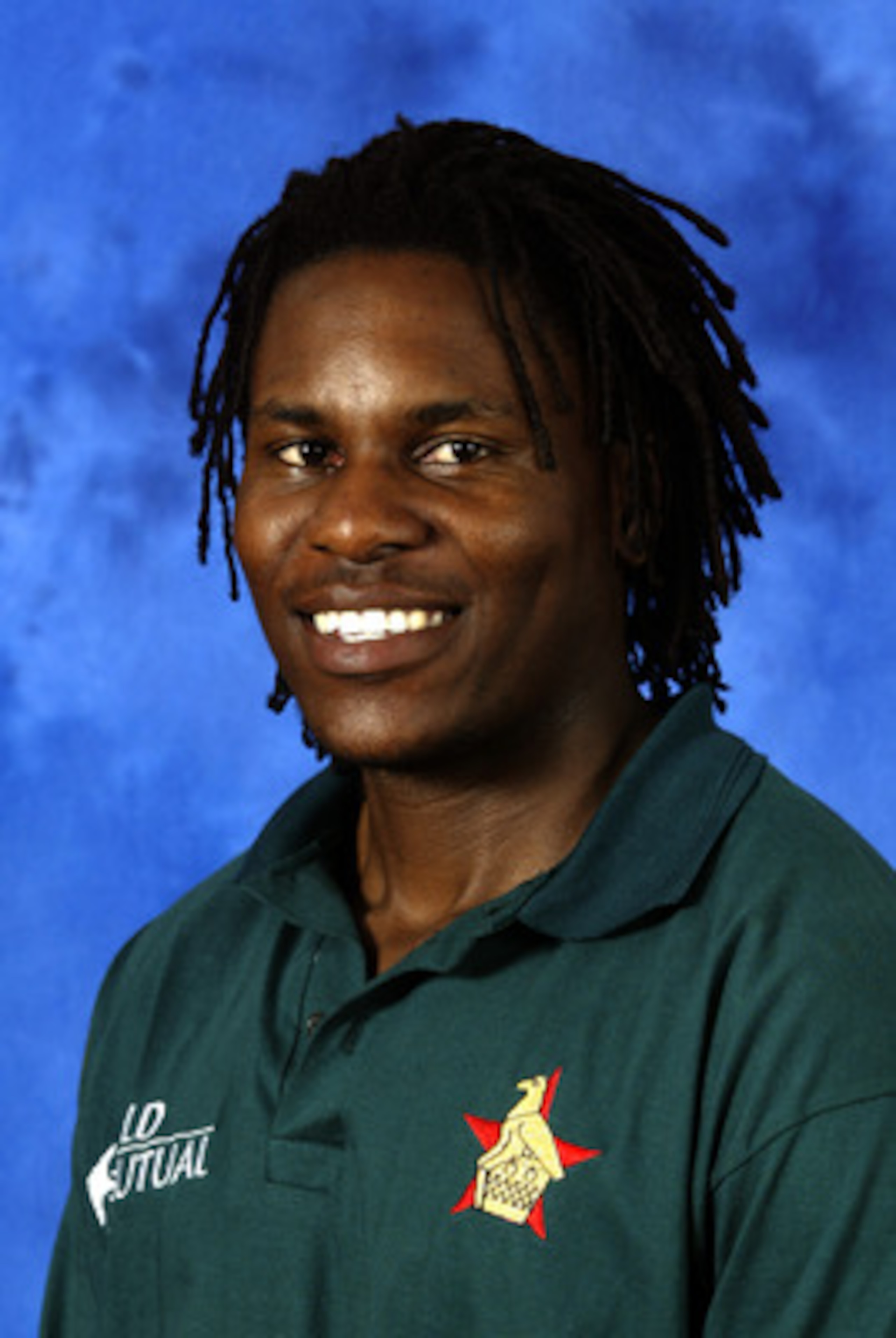 COLOMBO - SEPTEMBER 10:  A portrait of Mpumelelo Mbangwa of Zimbabwe, taken before the ICC Champions Trophy on September 10, 2002 in Colombo, Sri Lanka. (Photo by Clive Mason/Getty Images)